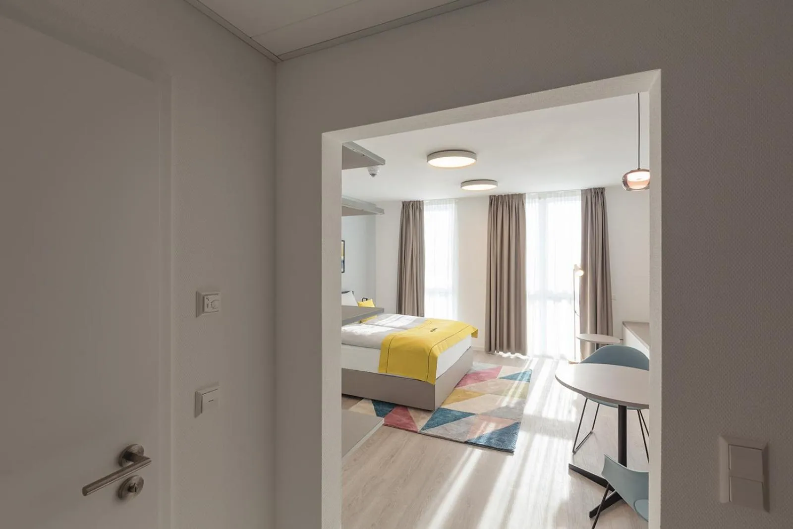 Living room, Bed in acora Heidelberg