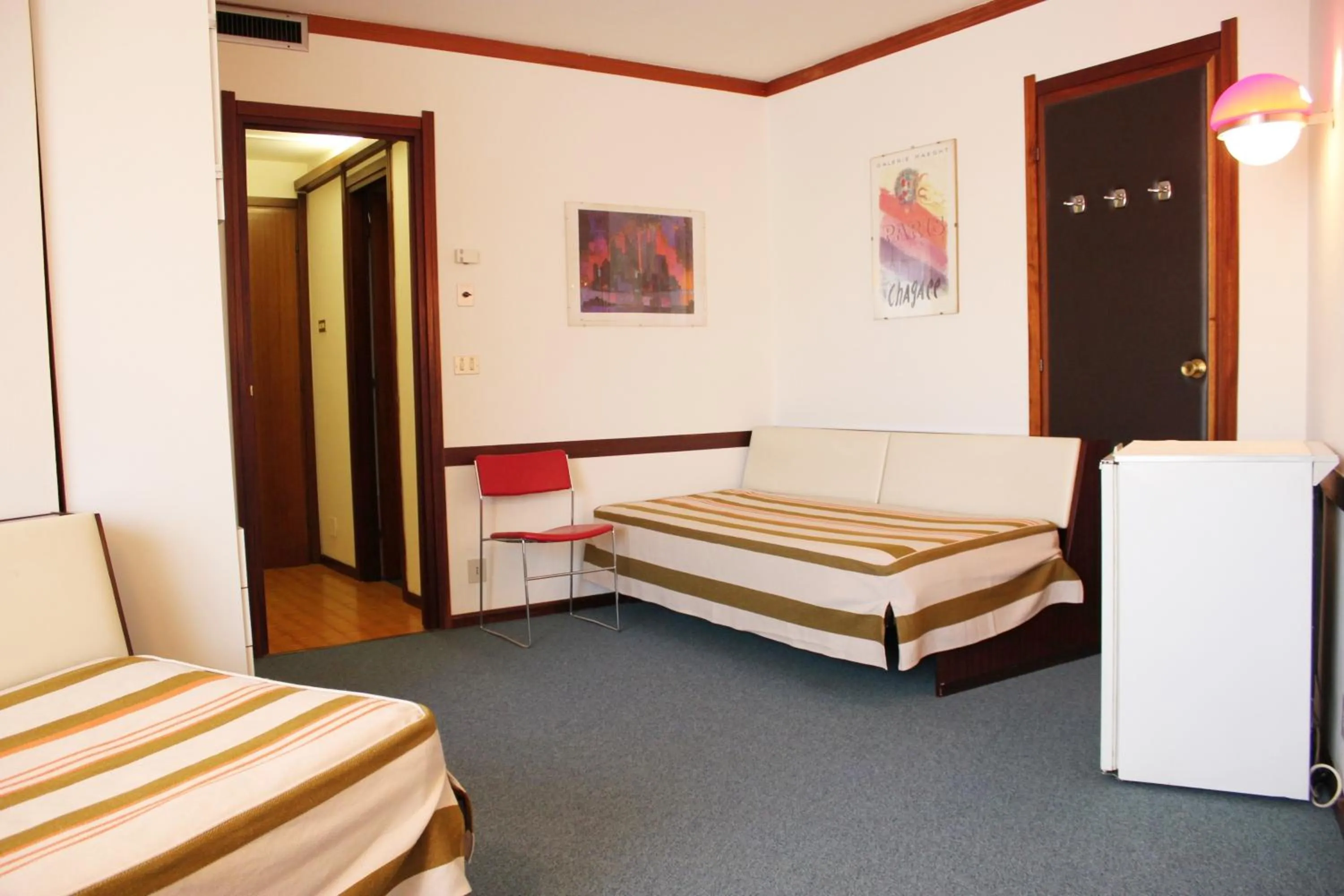 Living room, Bed in Albergo Residence Italia Vintage Hotel