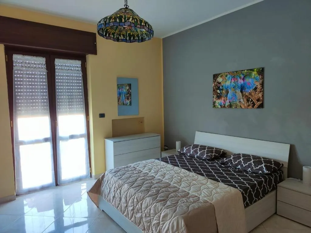 Bed in B&B PERNA Panoramic Rooms