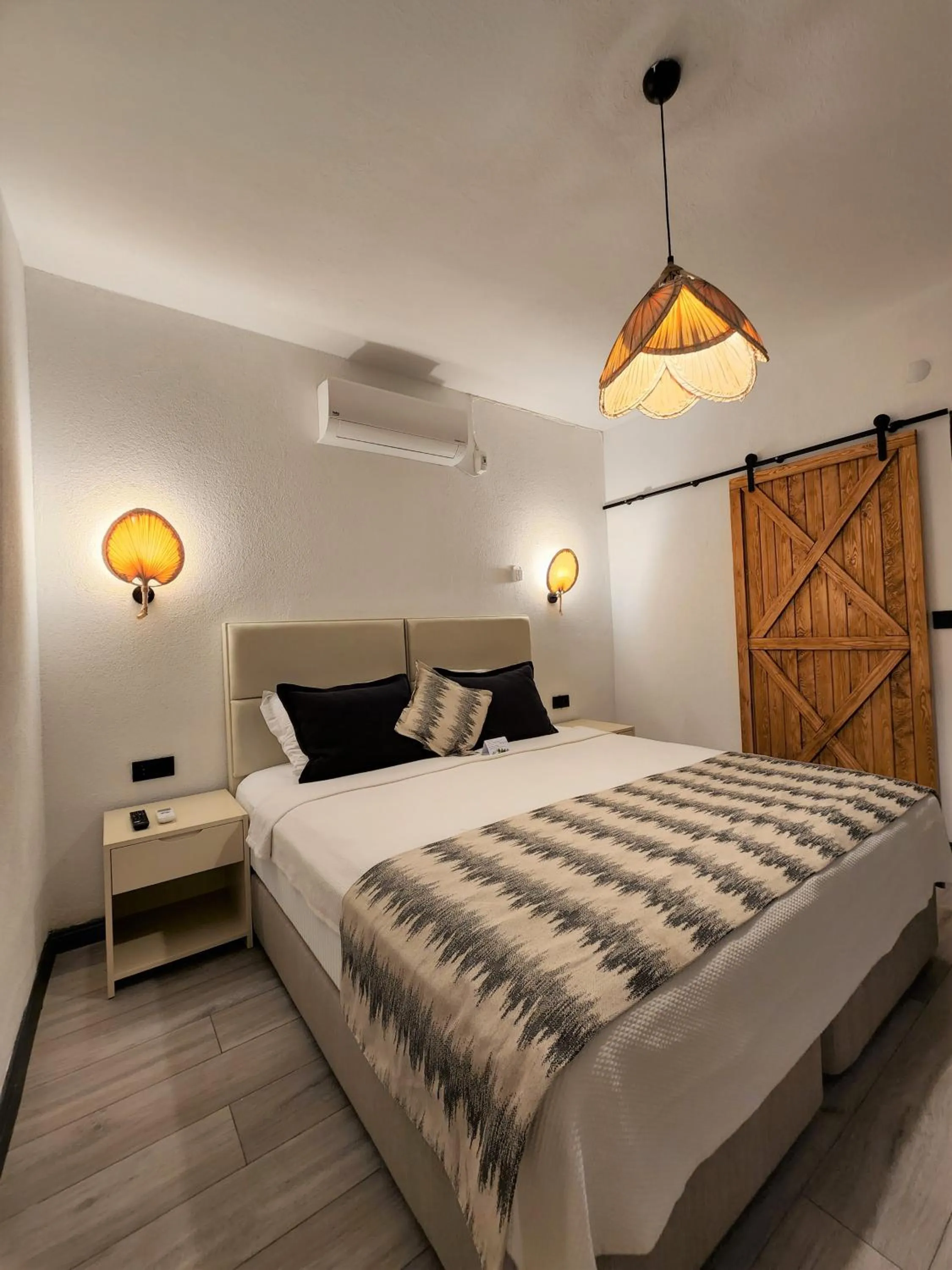 Bed in Dolce Vita Luxury Bungalows