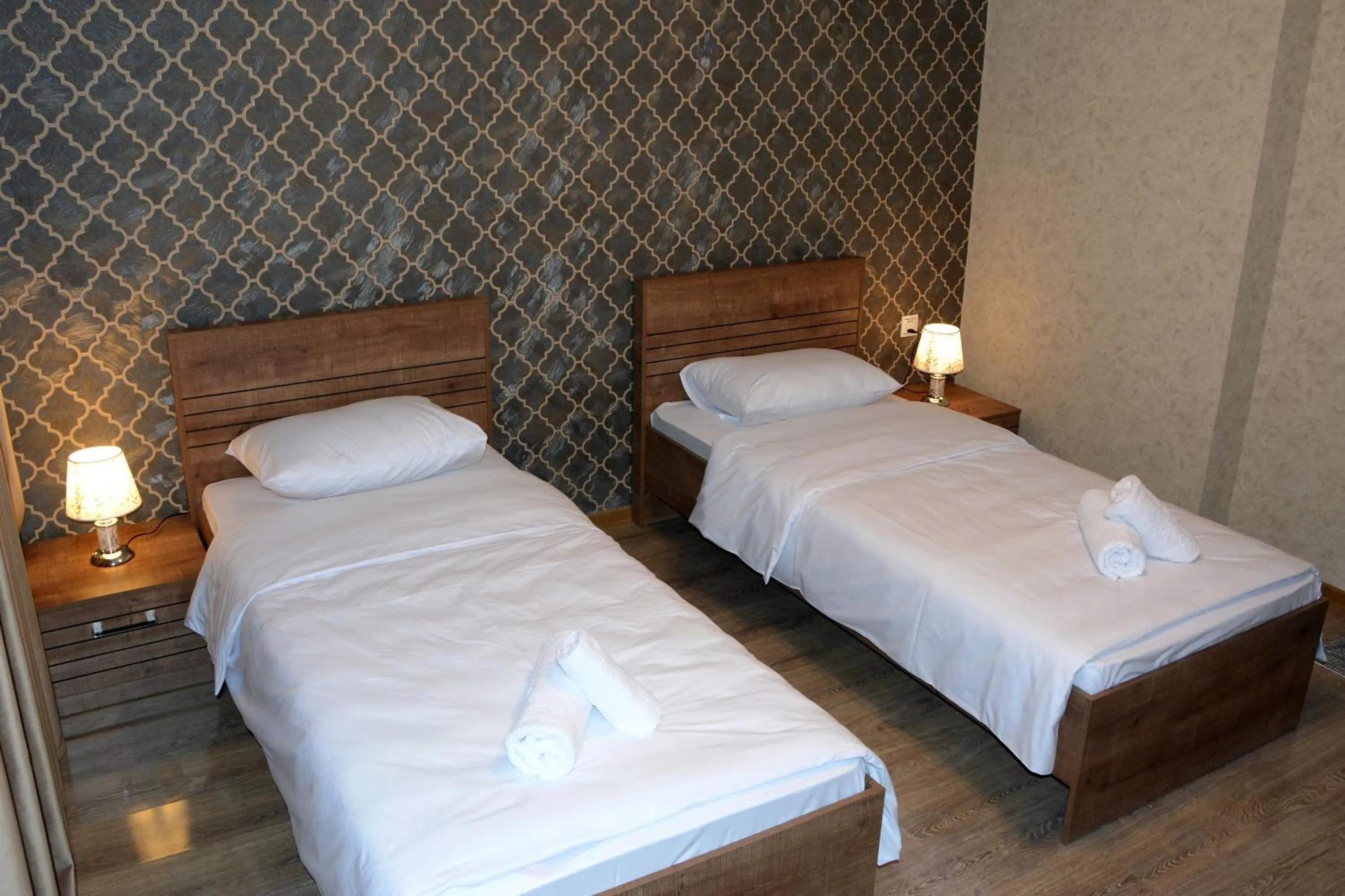 Bed in Tulpan Park Hotel
