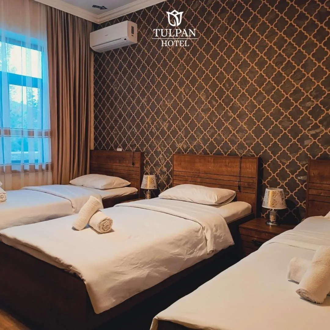 Bed in Tulpan Park Hotel