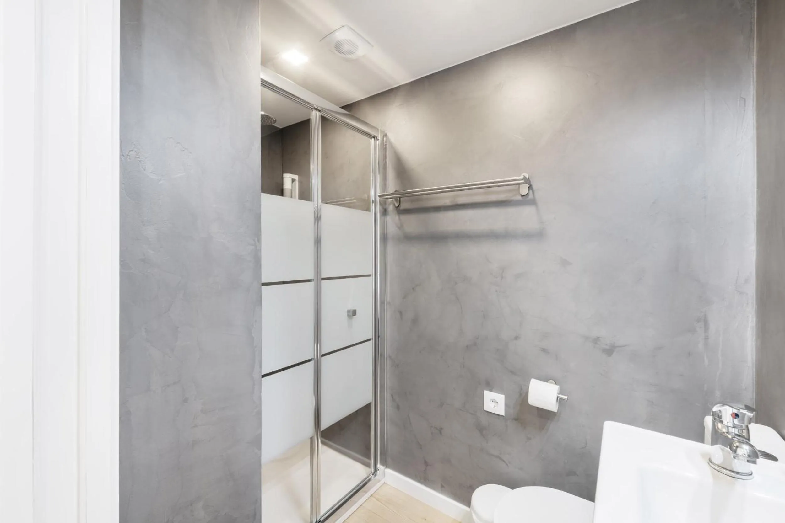 Bathroom in Ocean Apartment by Olala Homes