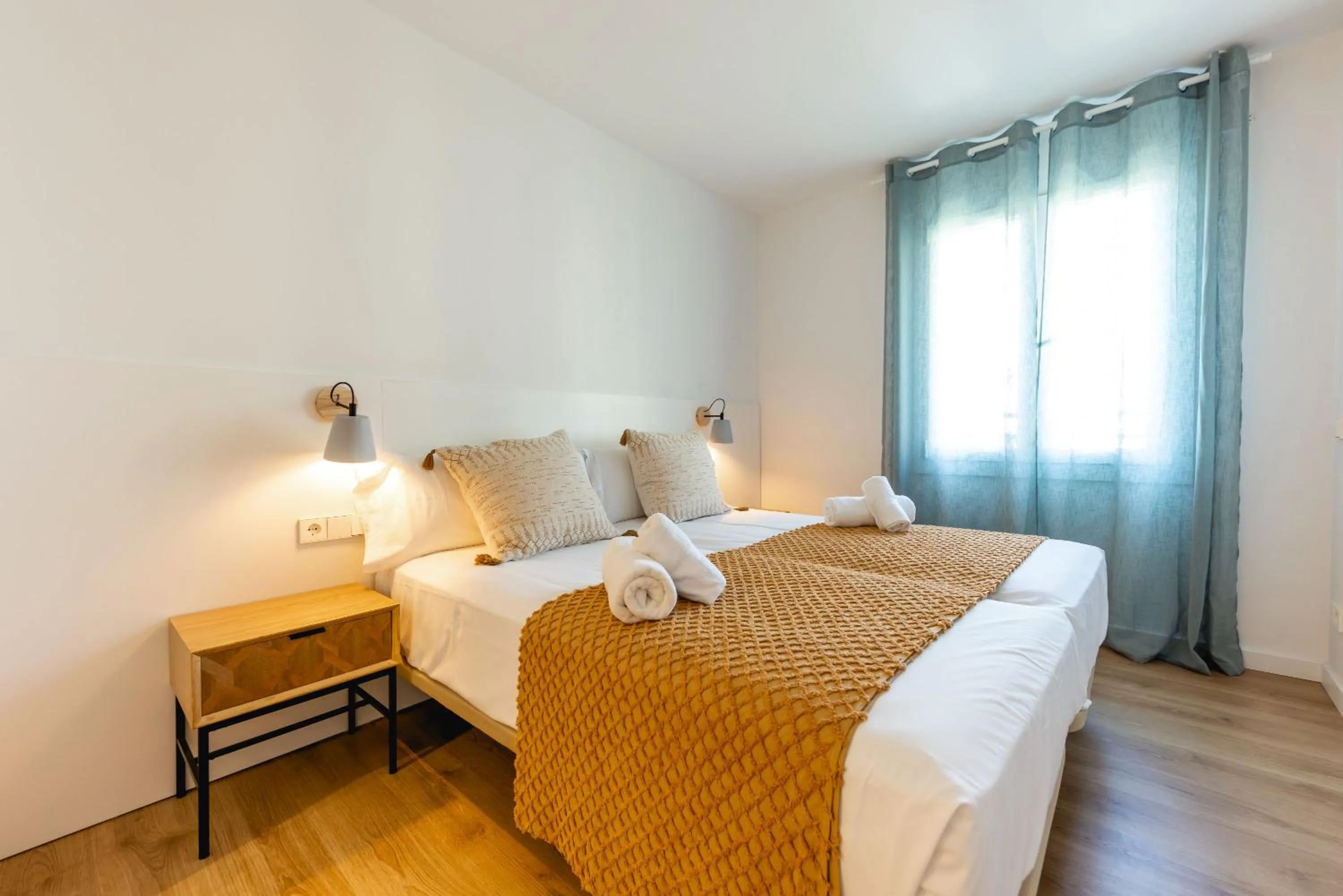 Bed in Bravissimo Tarlà, 2-bedroom apartment