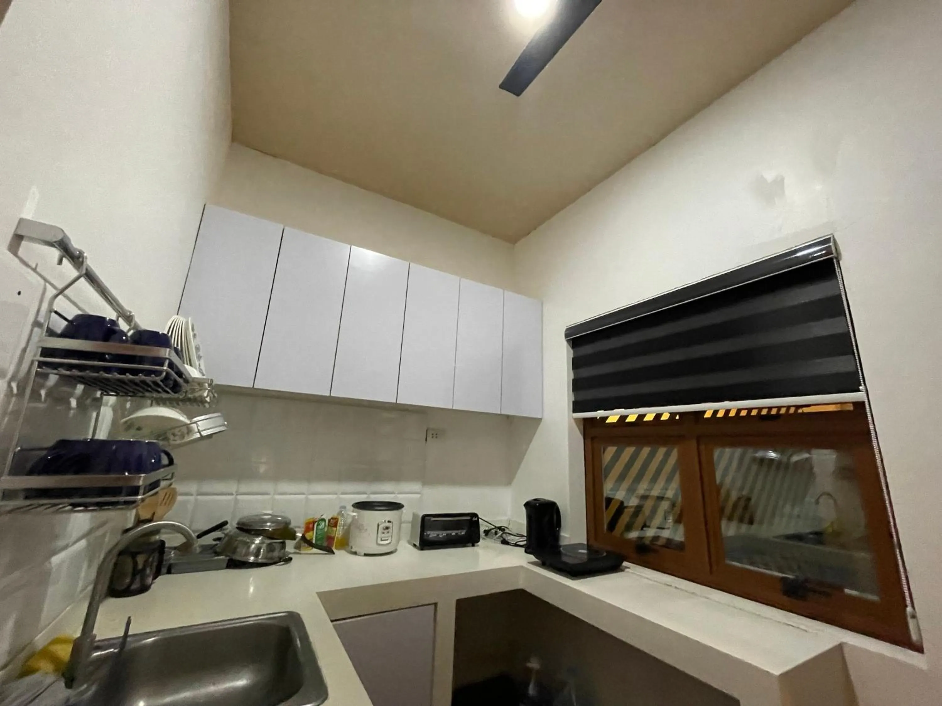 Kitchen or kitchenette in Sto Niño Residences Lucena City