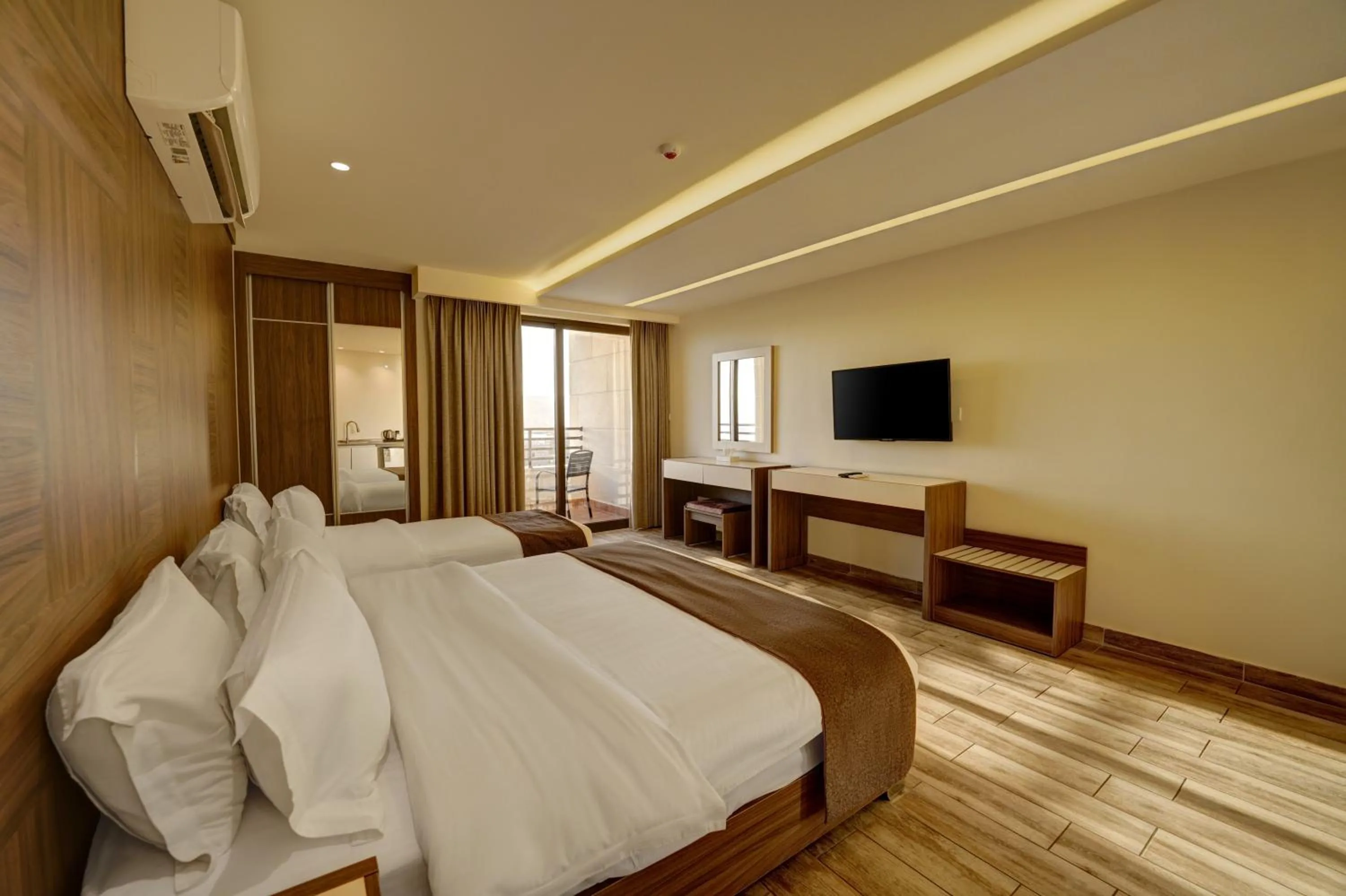 Communal lounge/ TV room, Bed in Luciana Hotel by FHM