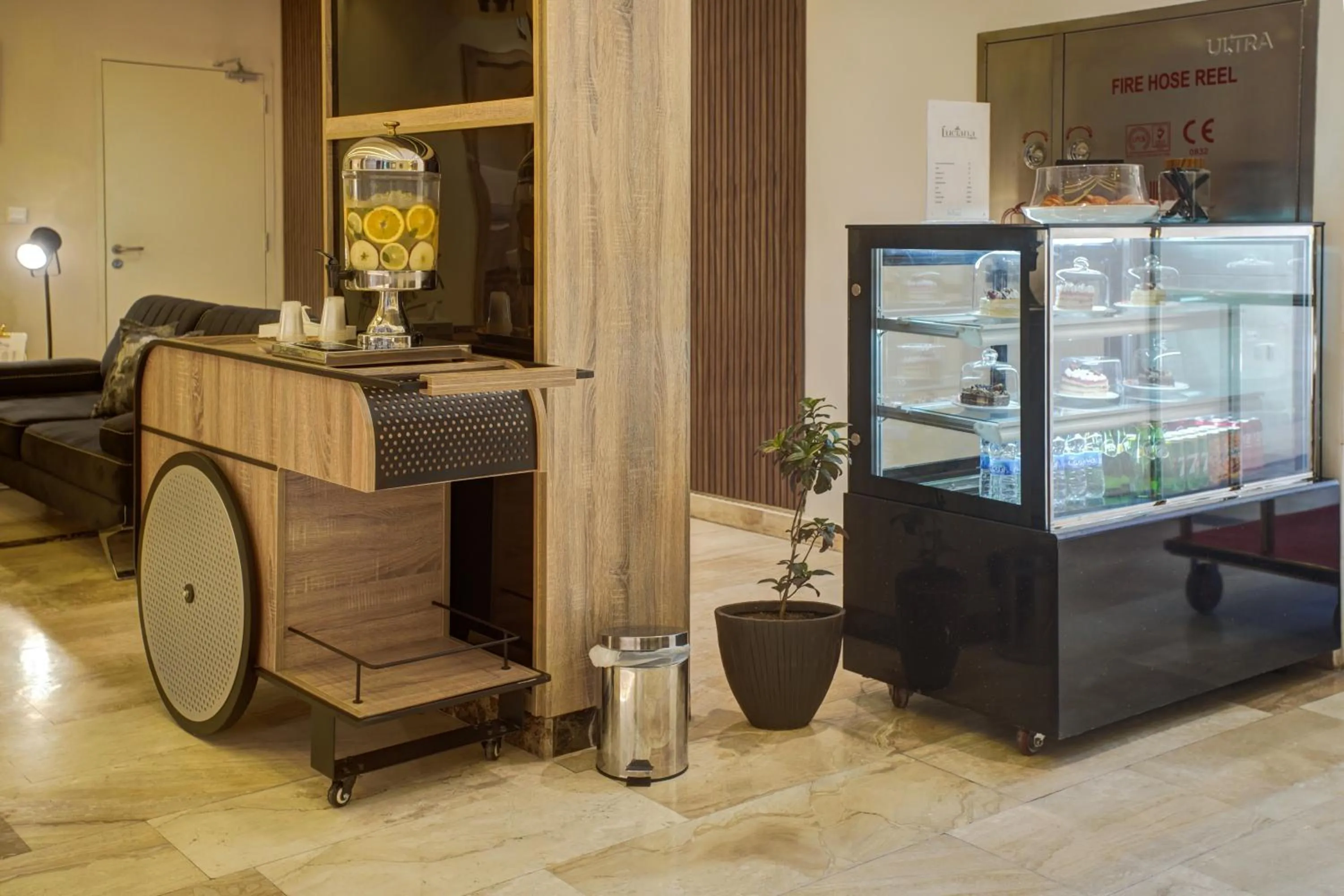 Seating area in Luciana Hotel by FHM