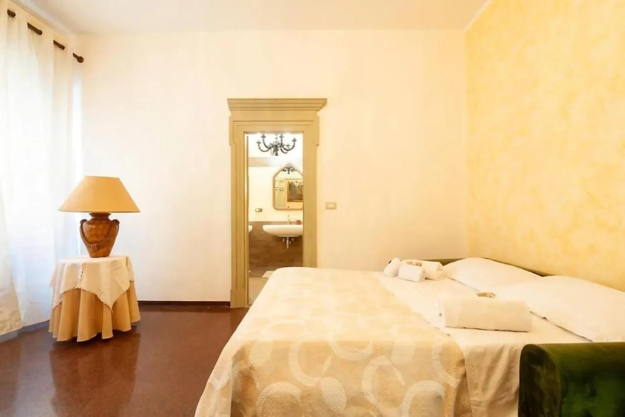 Bed in Errico Suite e Rooms