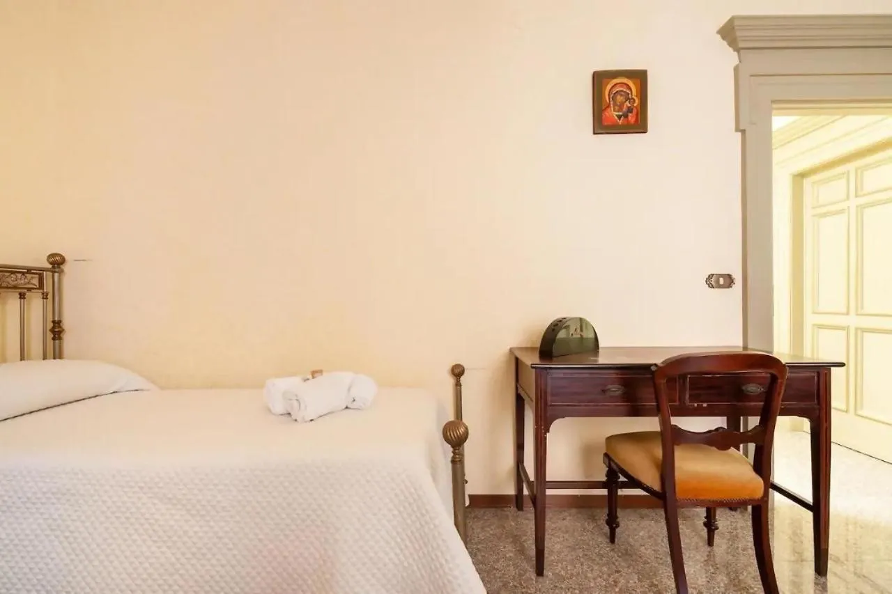 Bed in Errico Suite e Rooms