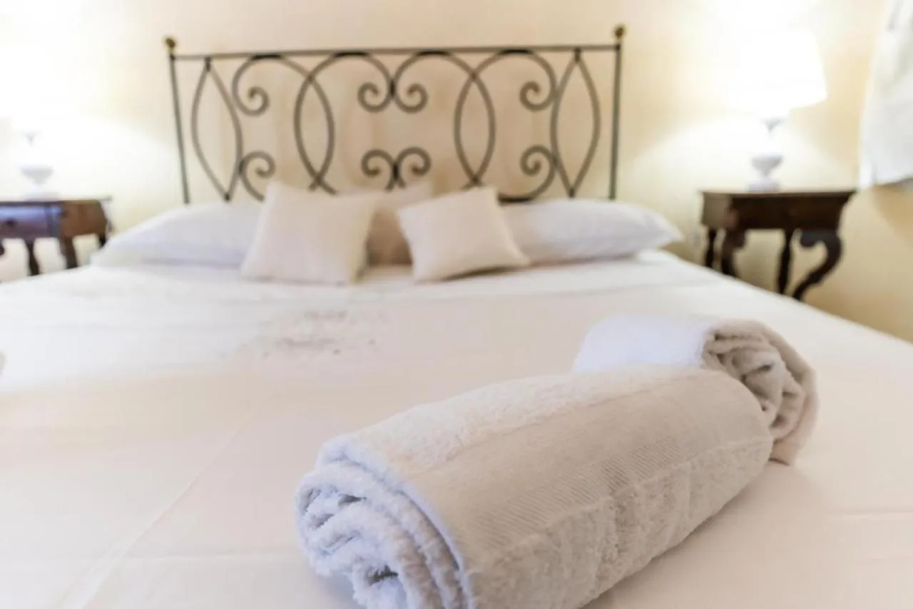 Bed in Errico Suite e Rooms