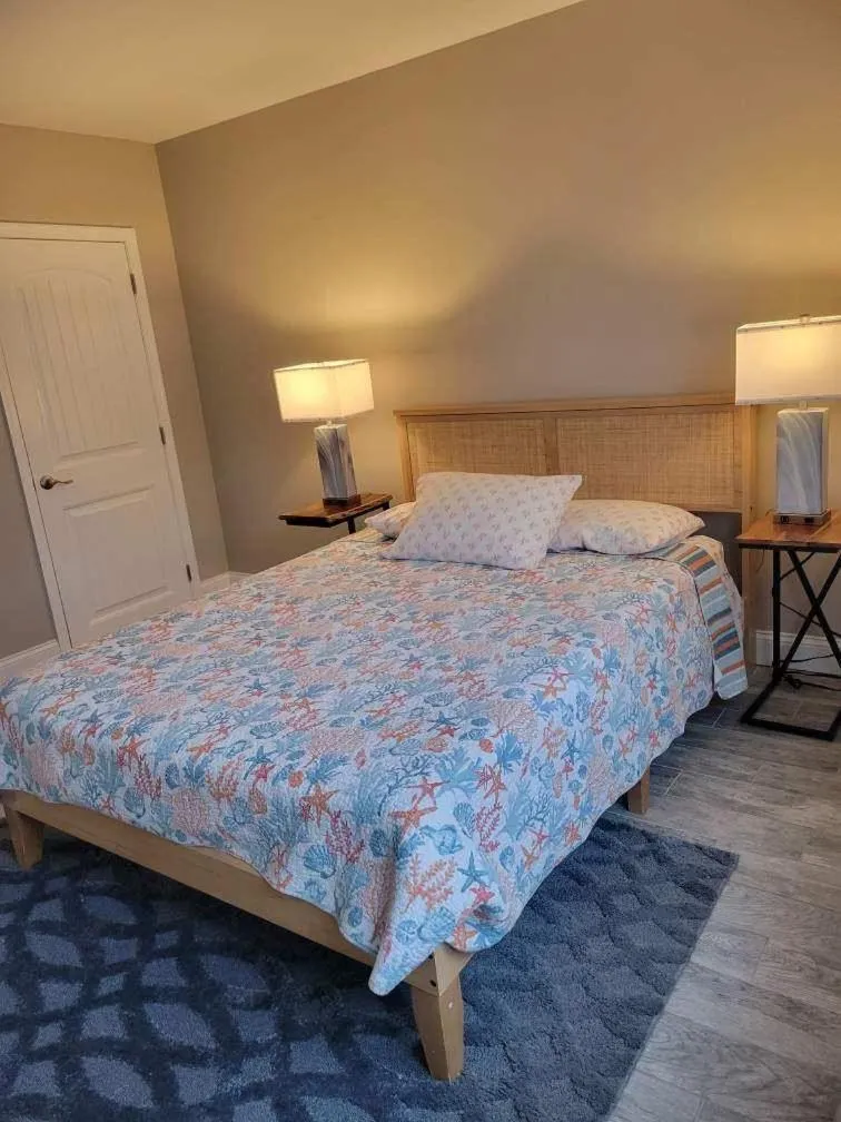 Bed in Radiant Beach Block Condo Parking Patio