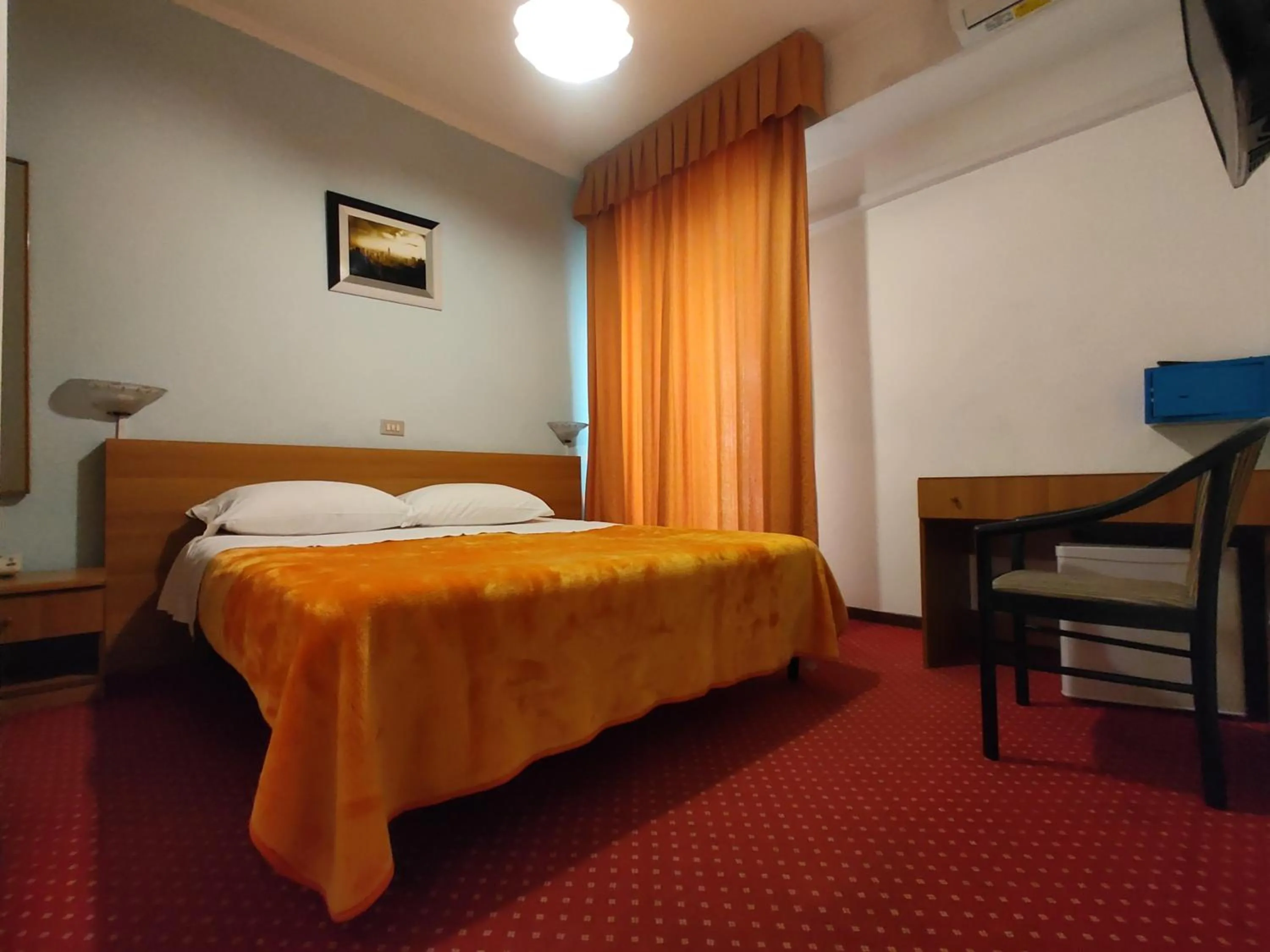 Bed in Hotel Sorriso
