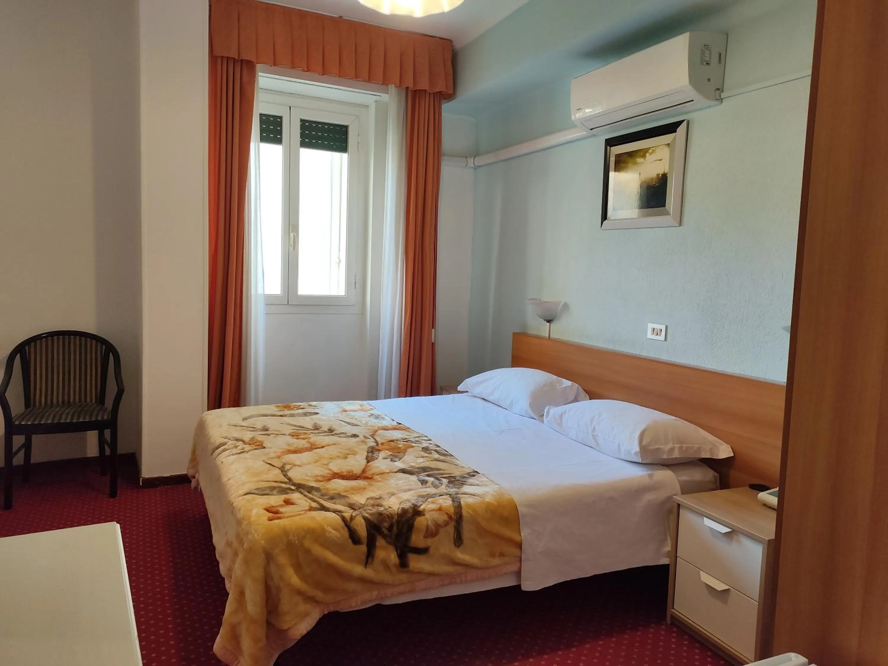 Bed in Hotel Sorriso