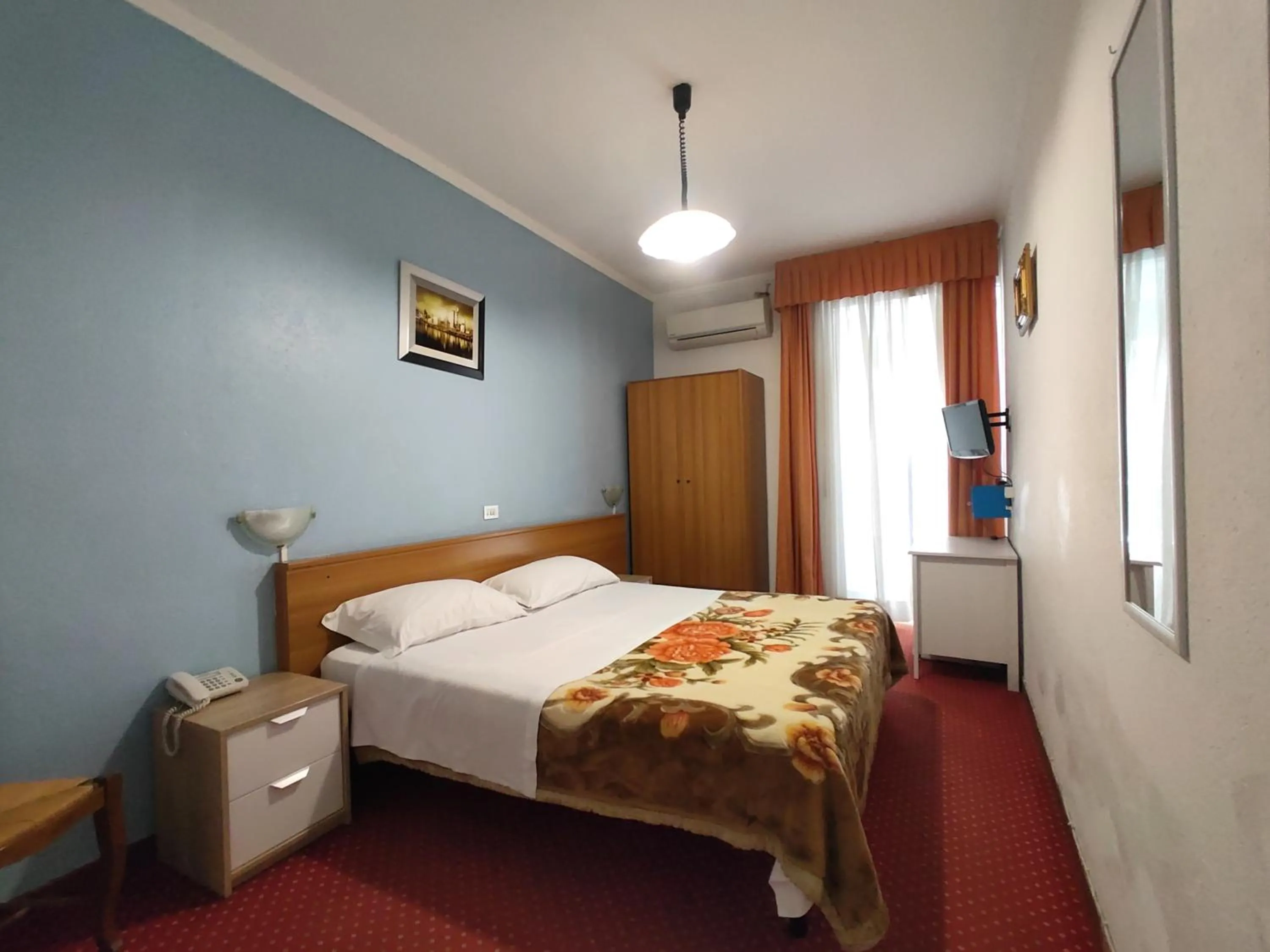 Bed in Hotel Sorriso