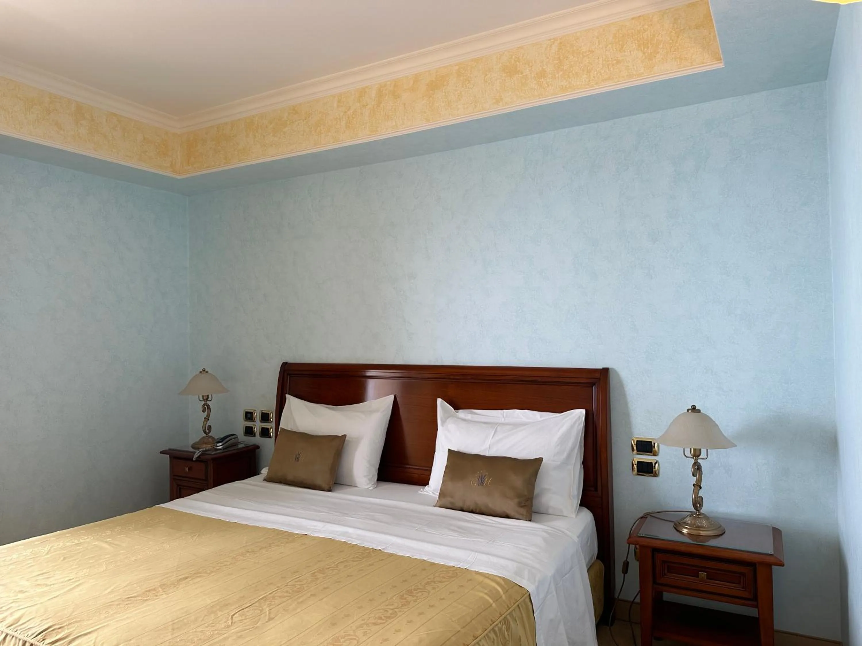 Bed in Gardenia Hotel