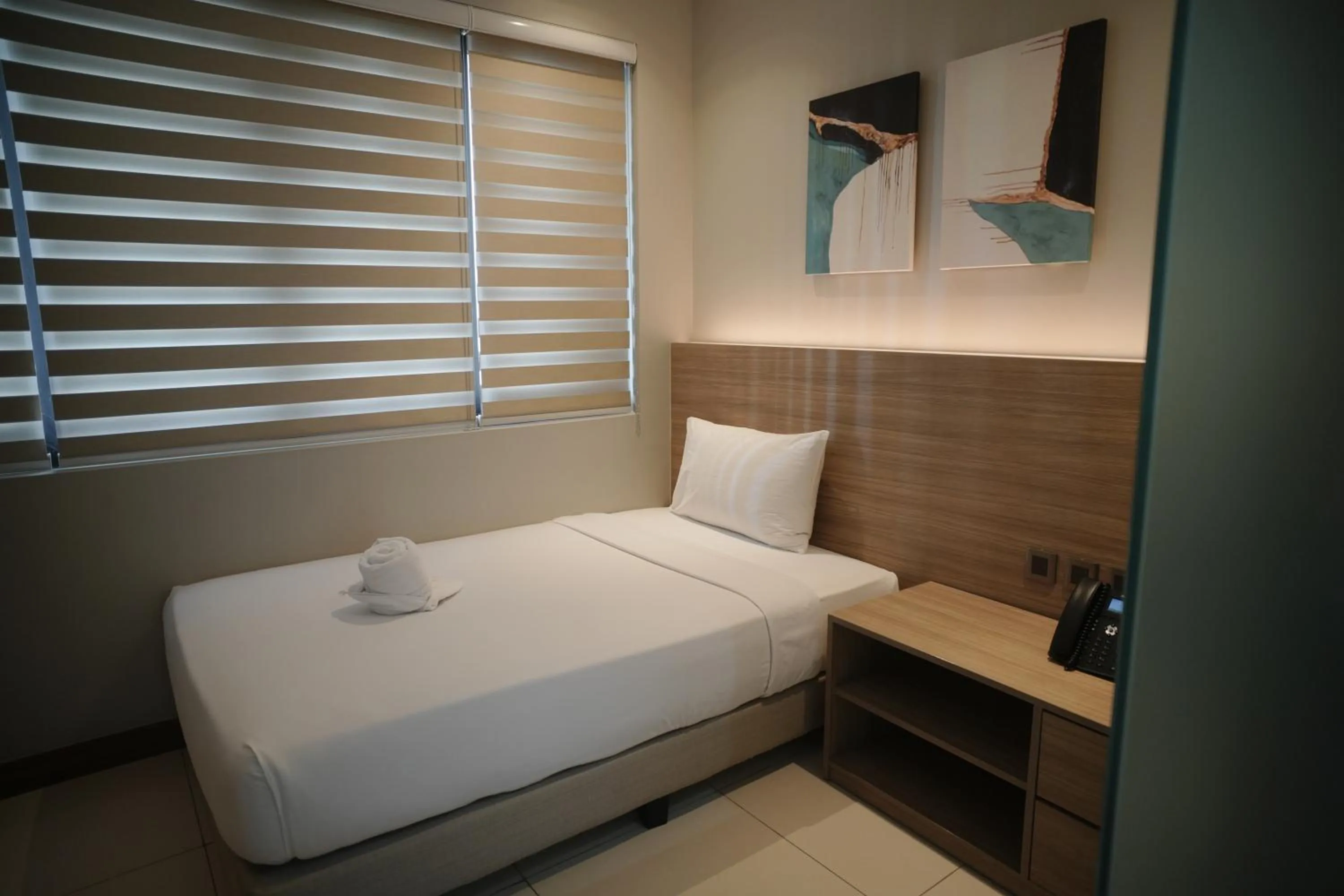 View (from property/room), Bed in The Hotel Andrea