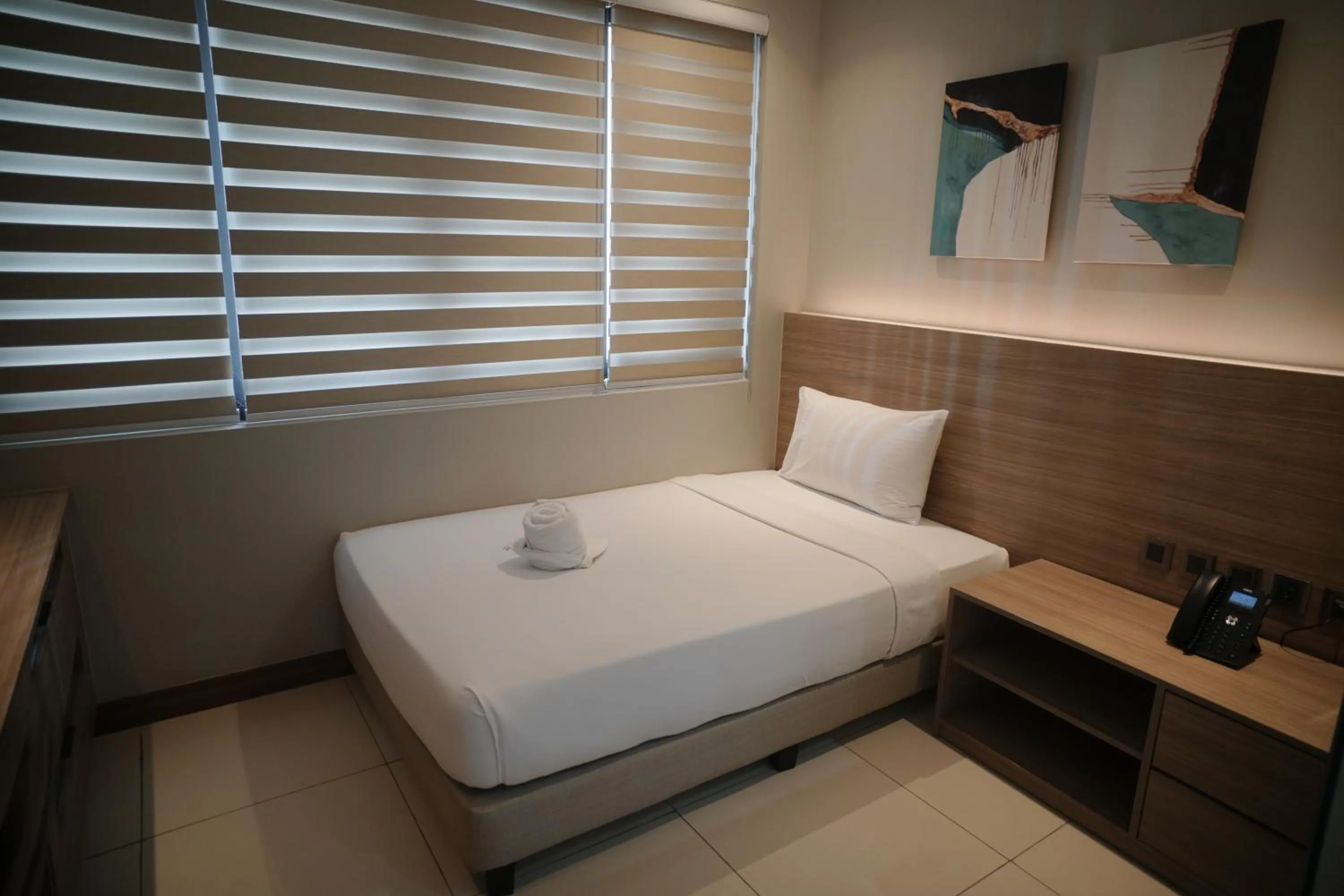 Bed in The Hotel Andrea