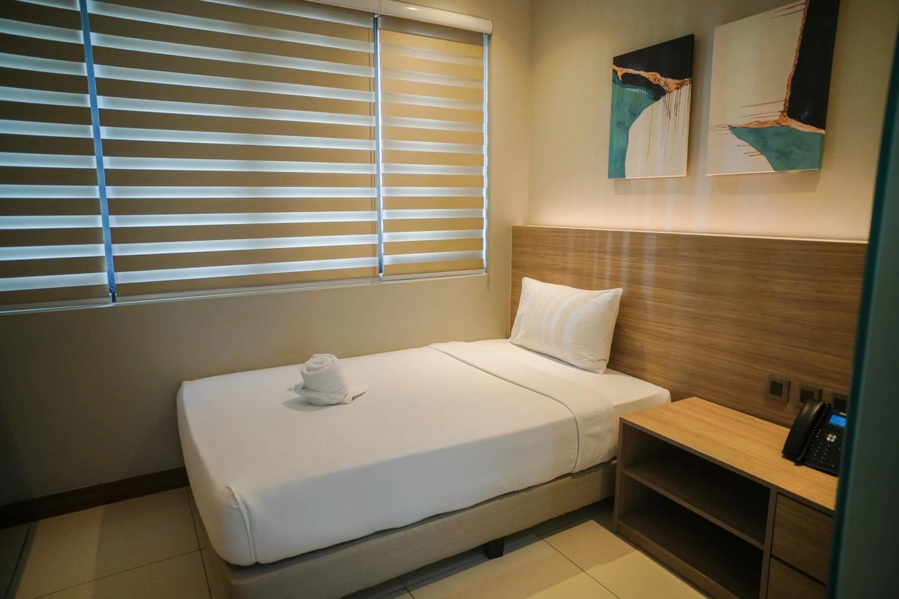 Bed in The Hotel Andrea