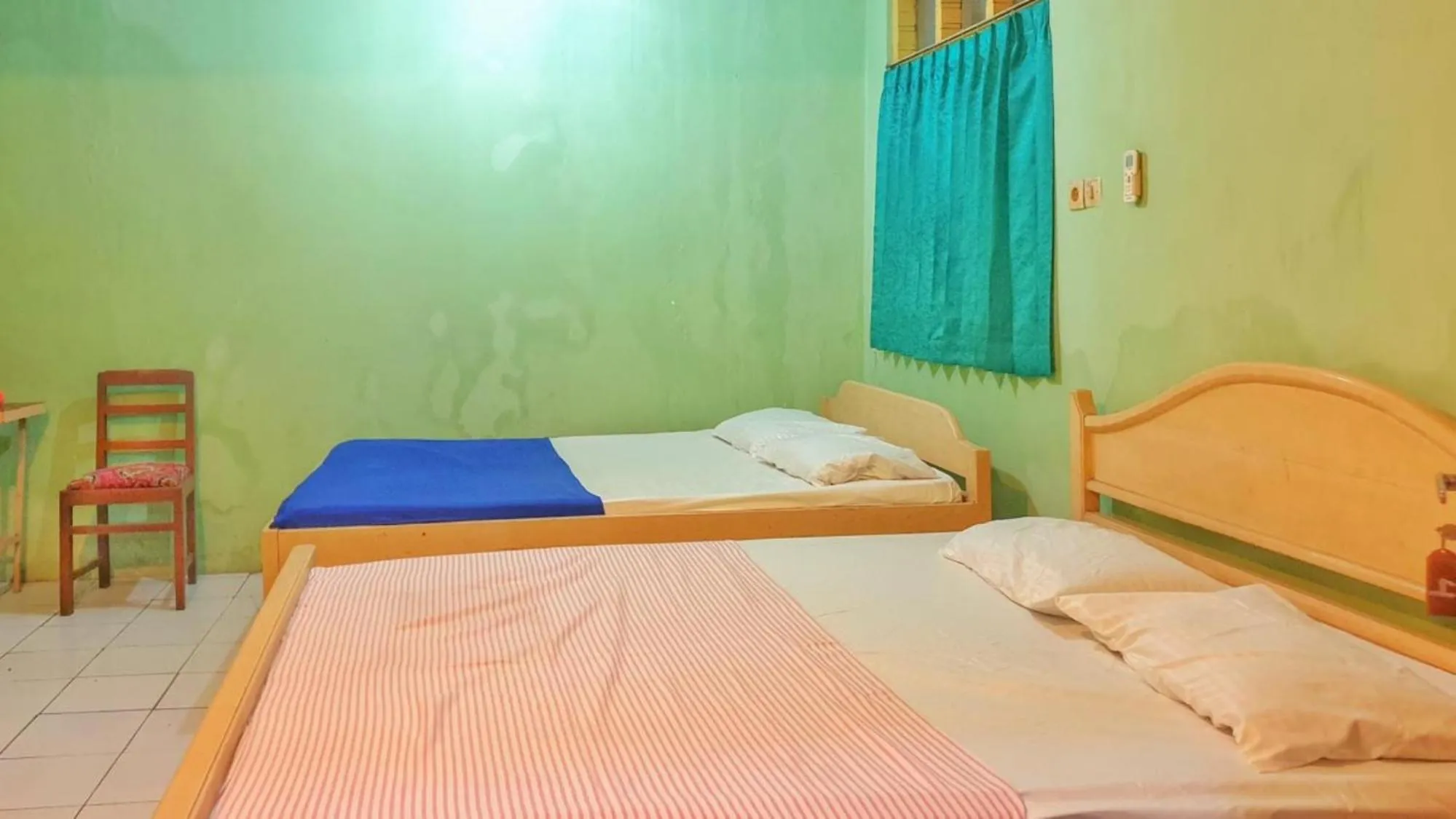 Bedroom, Bed in Hotel Jaya Kusuma near Candi Prambanan Mitra RedDoorz