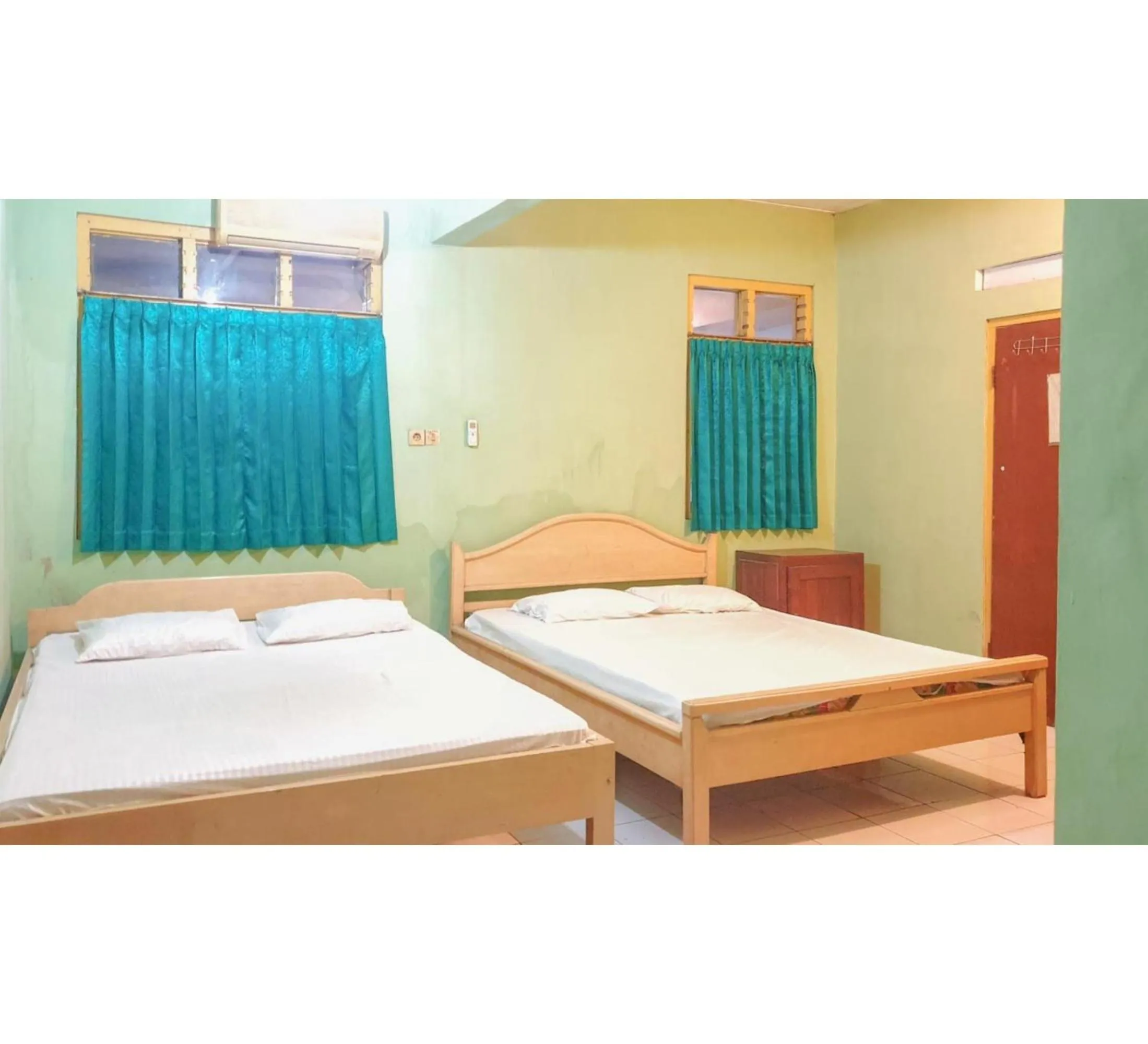 Bedroom, Bed in Hotel Jaya Kusuma near Candi Prambanan Mitra RedDoorz