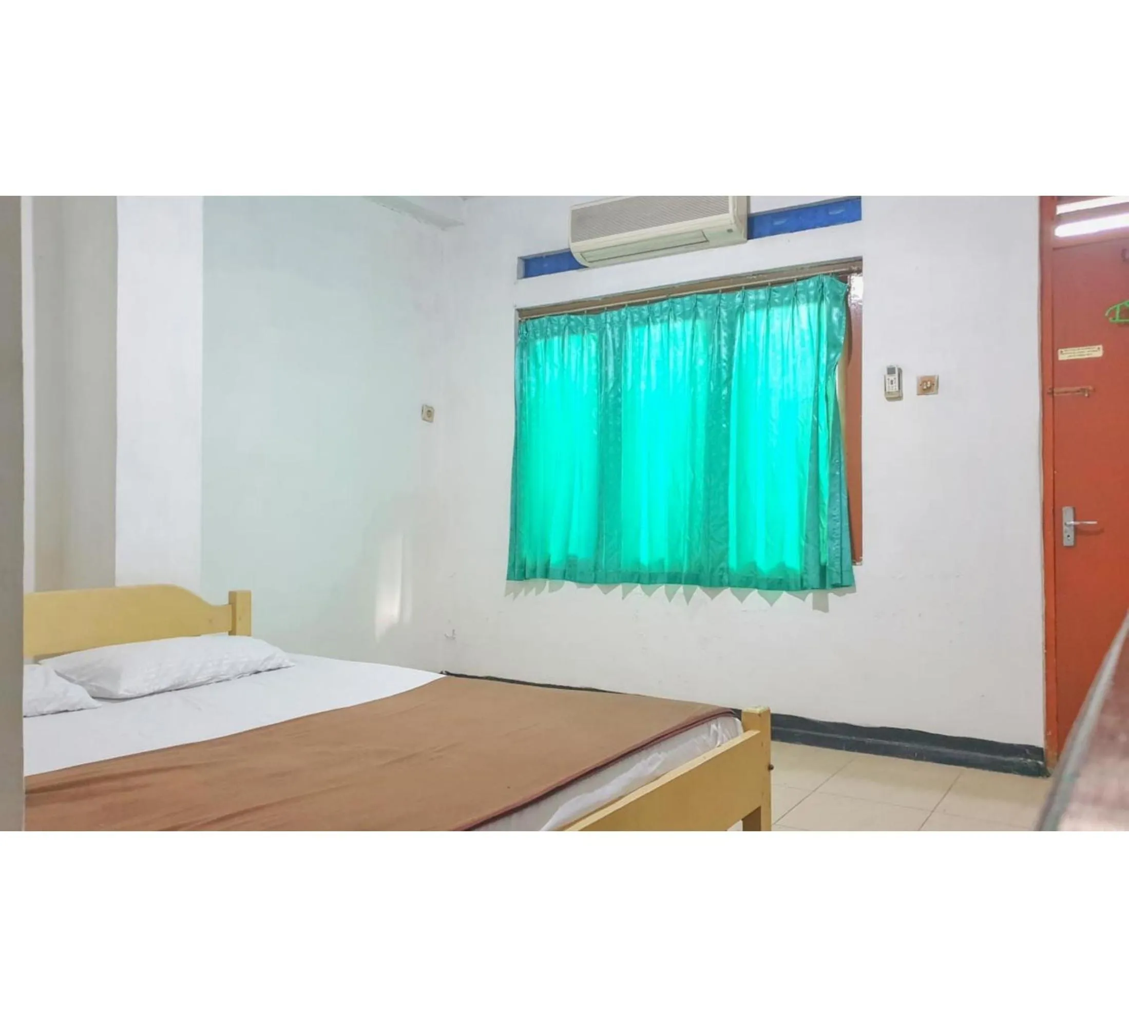 Bedroom, Bed in Hotel Jaya Kusuma near Candi Prambanan Mitra RedDoorz