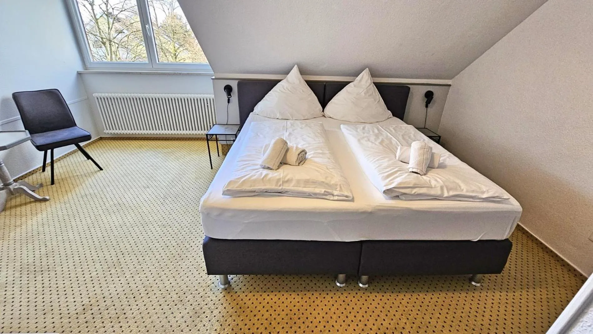 Bed in Hotel Schachener Hof