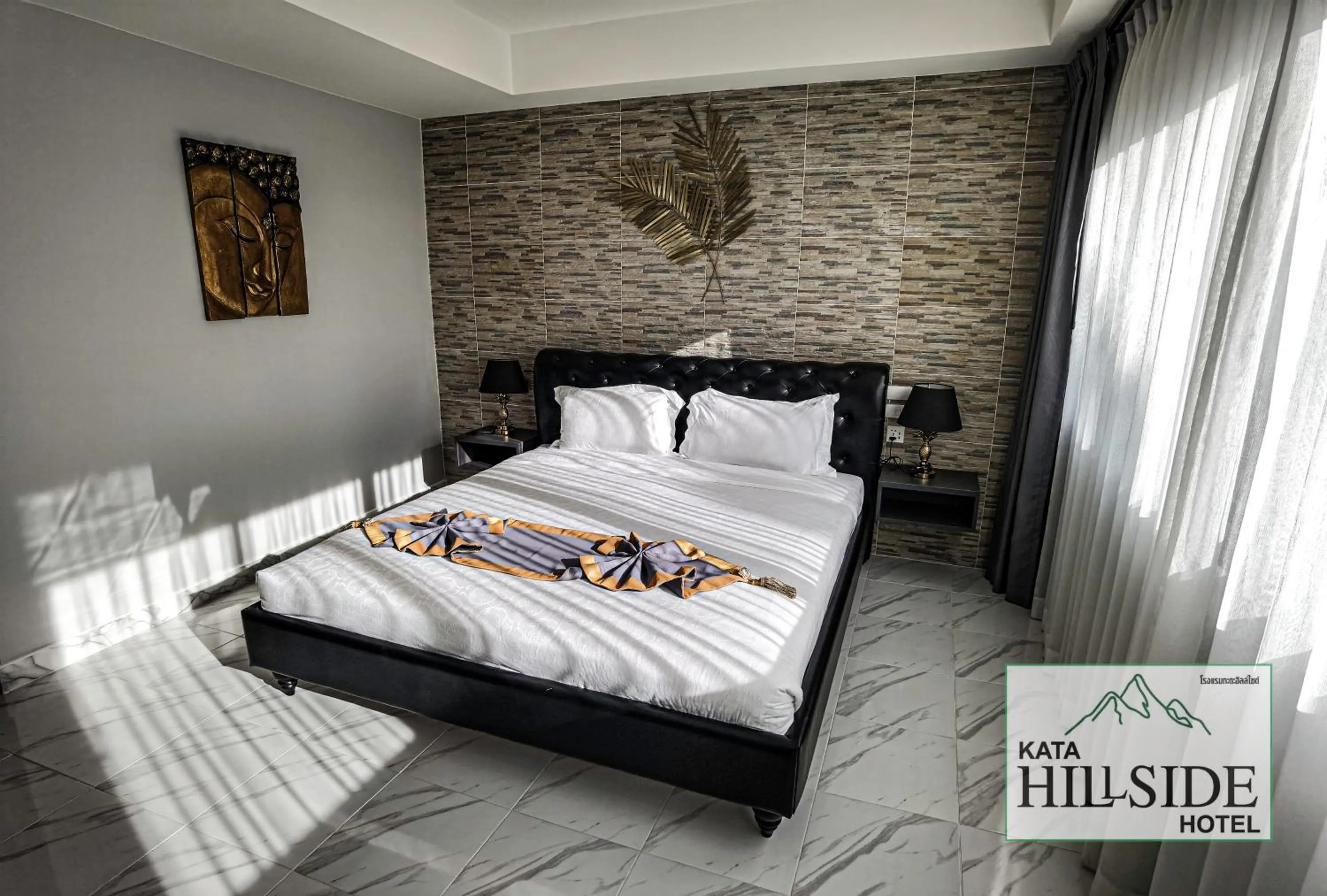 Bed in Kata Hillside Hotel