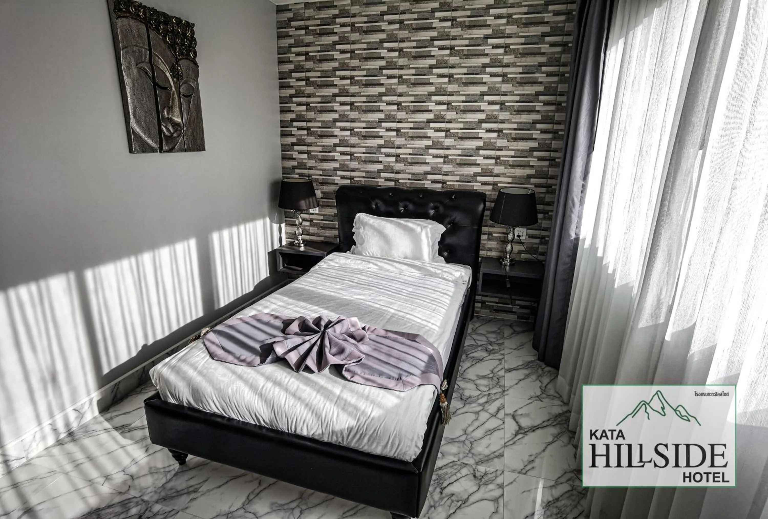 Bed in Kata Hillside Hotel