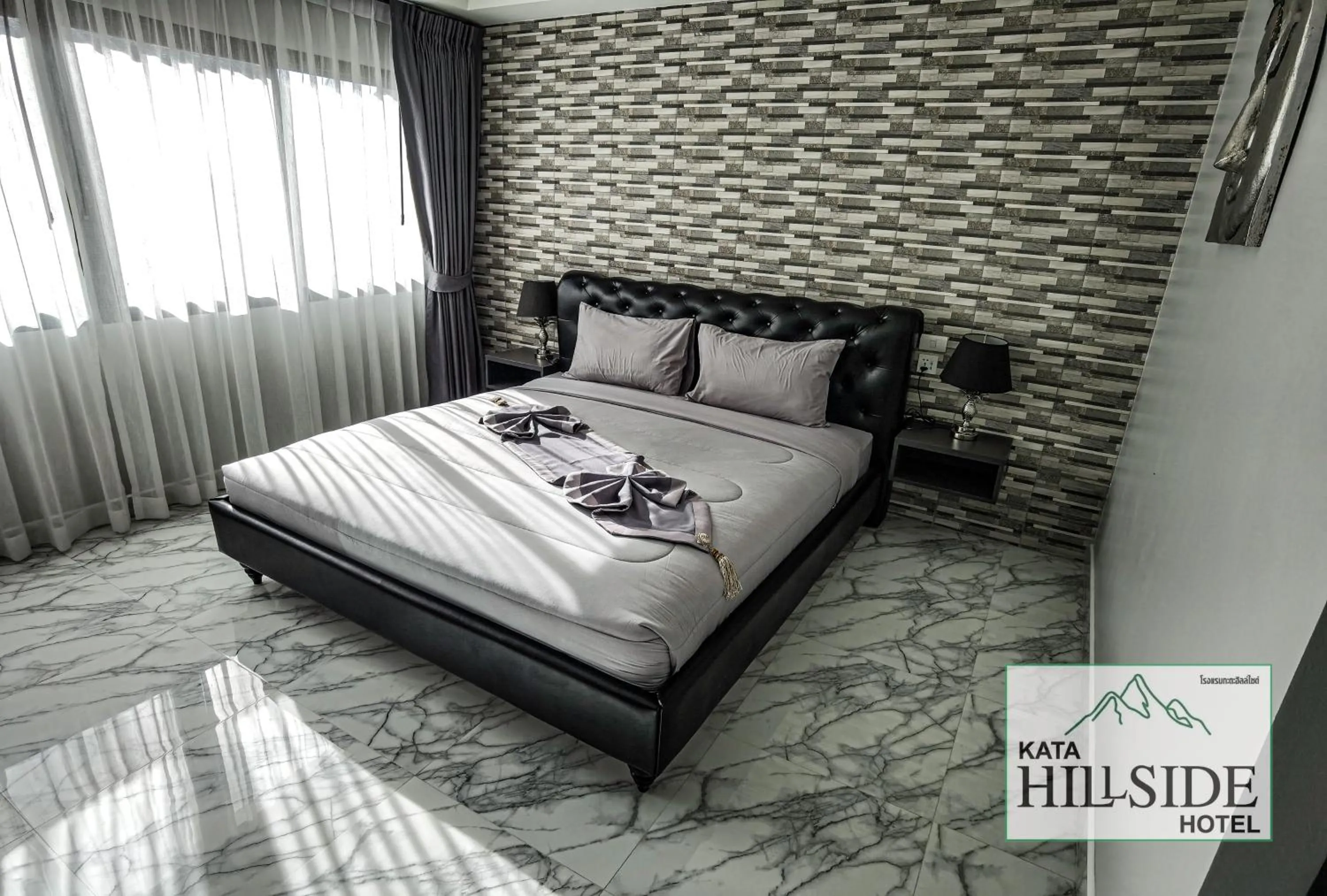 Bed in Kata Hillside Hotel