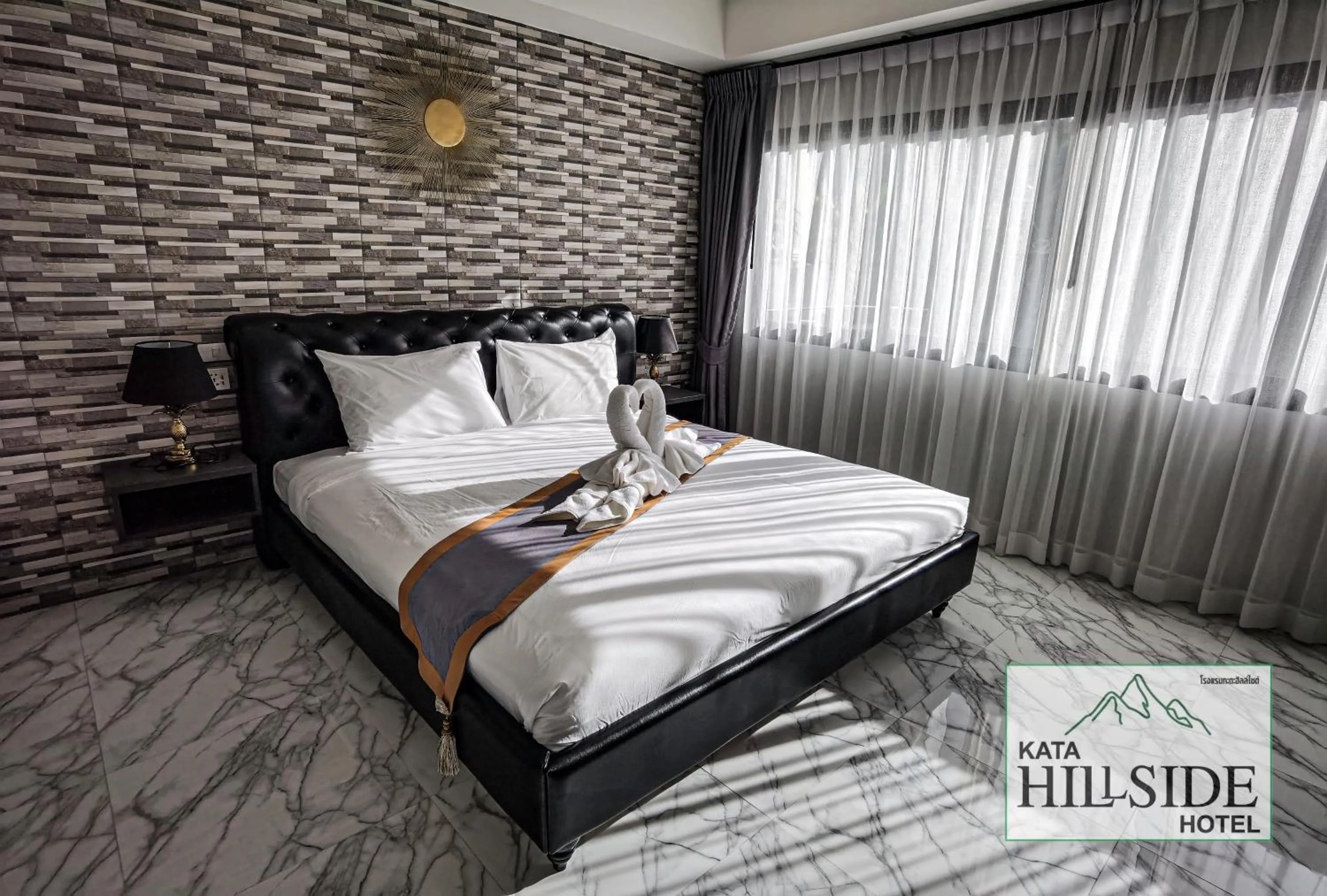 Bed in Kata Hillside Hotel