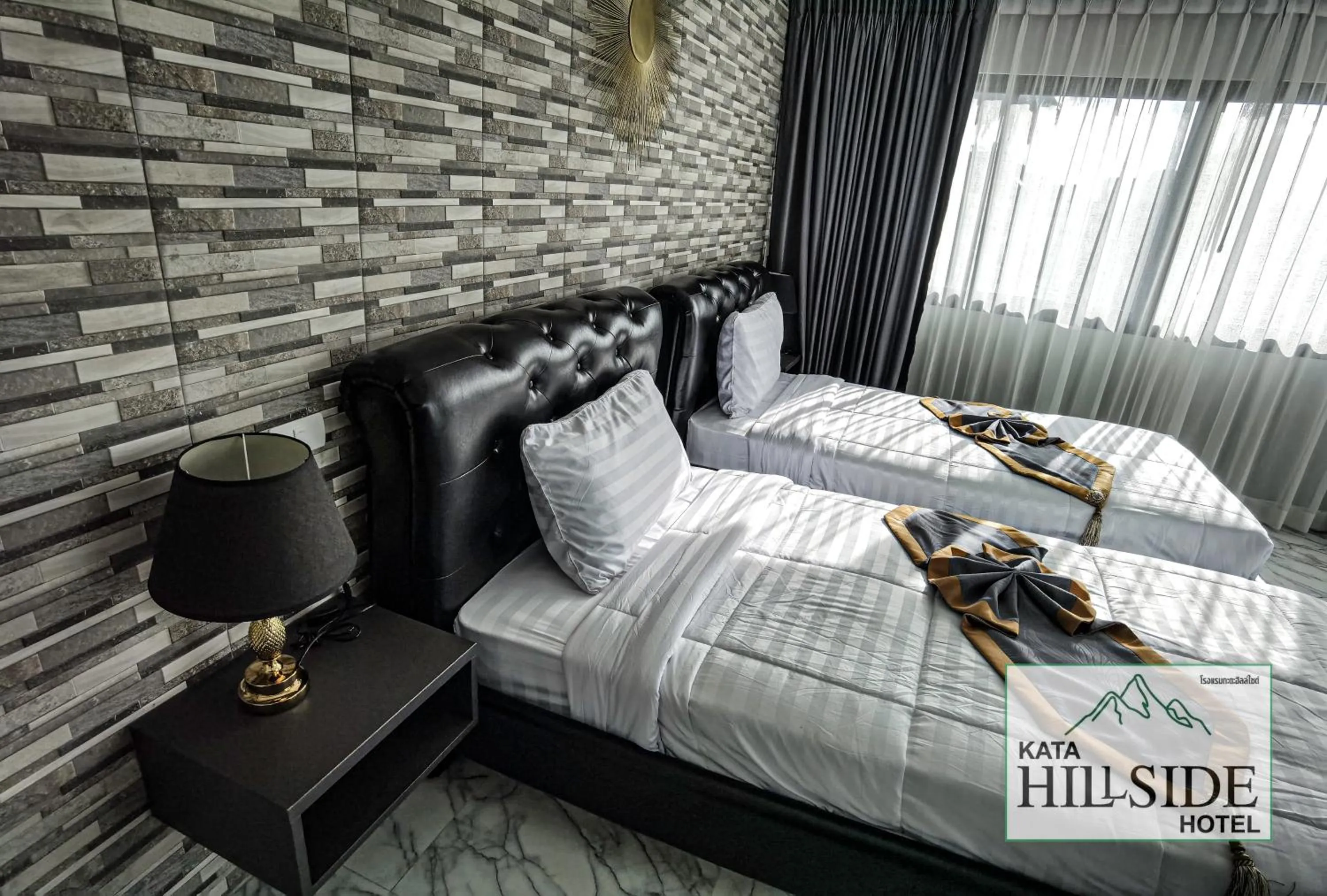 Bed in Kata Hillside Hotel