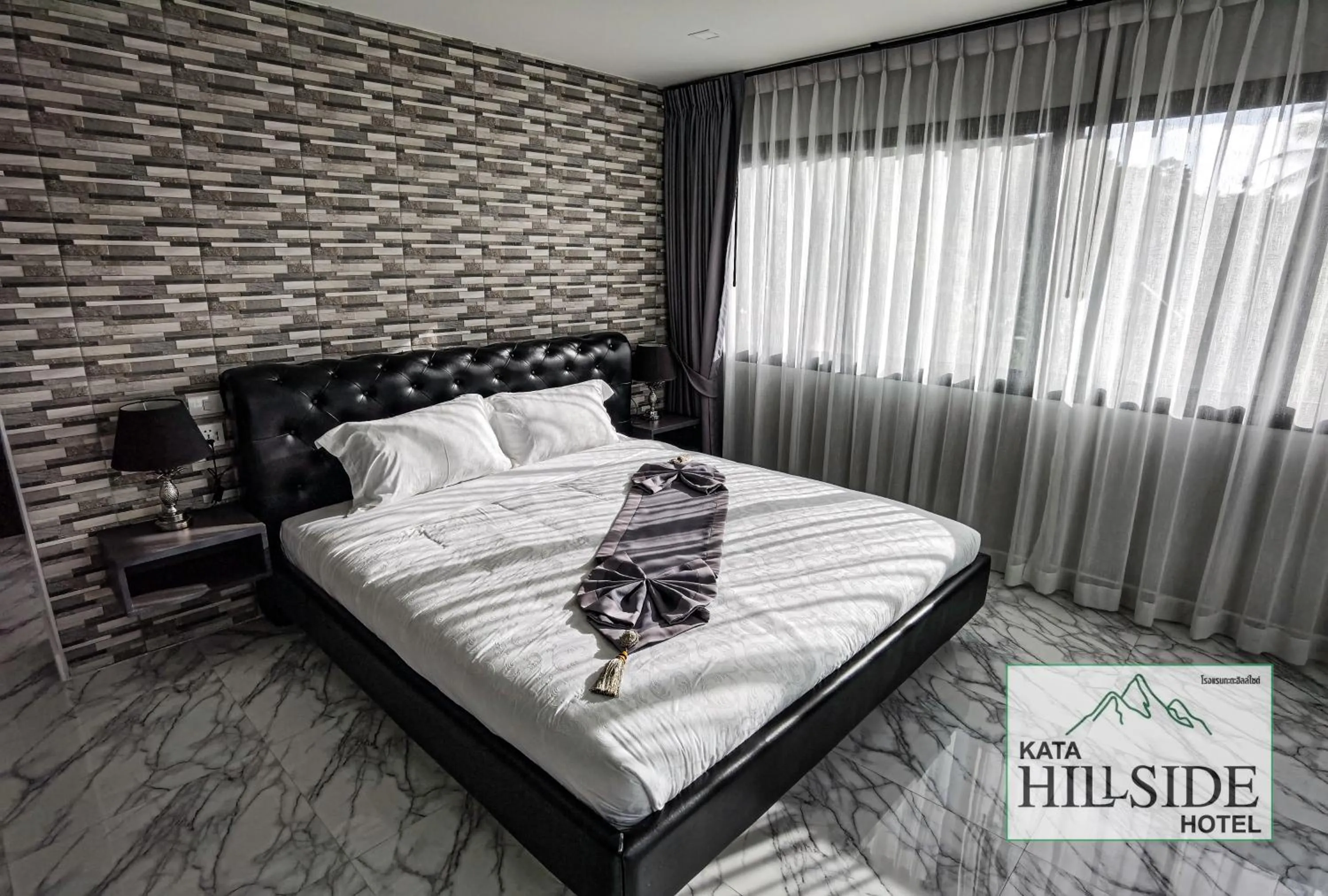 Bed in Kata Hillside Hotel