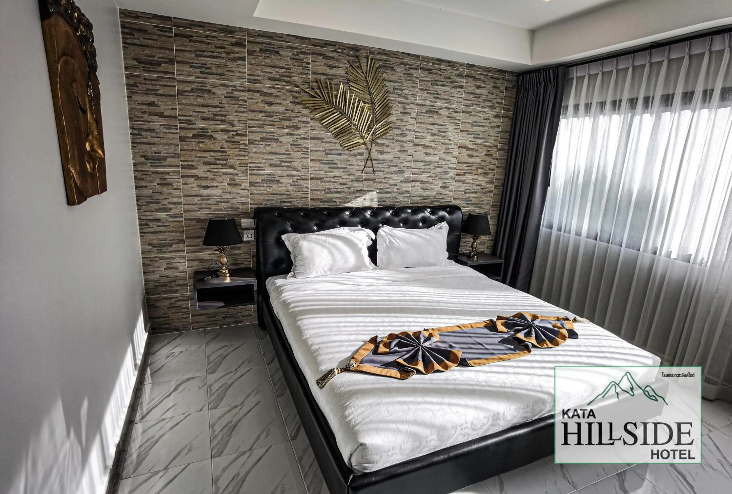 Bed in Kata Hillside Hotel