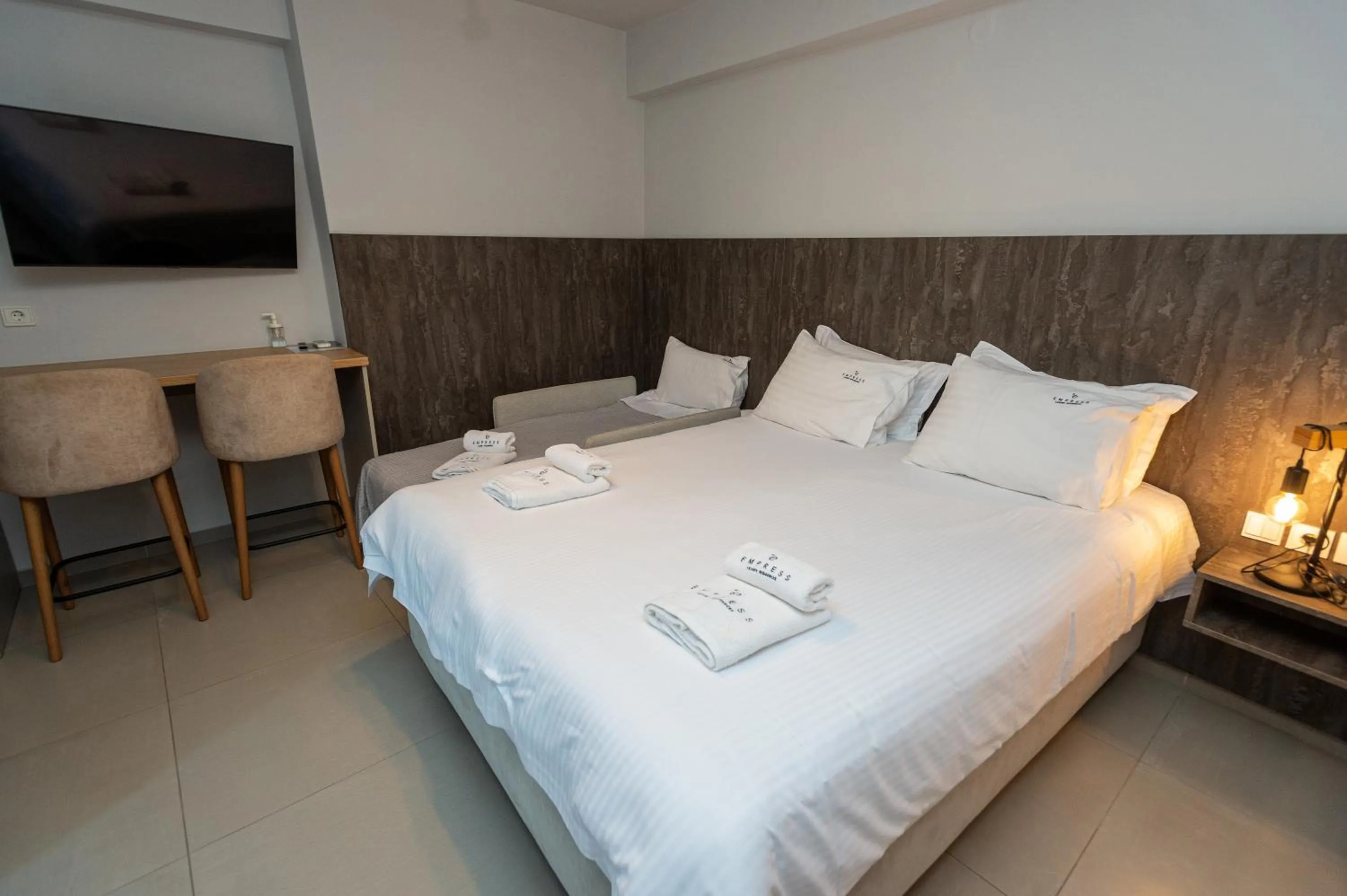Bed in Empress Luxury Residences