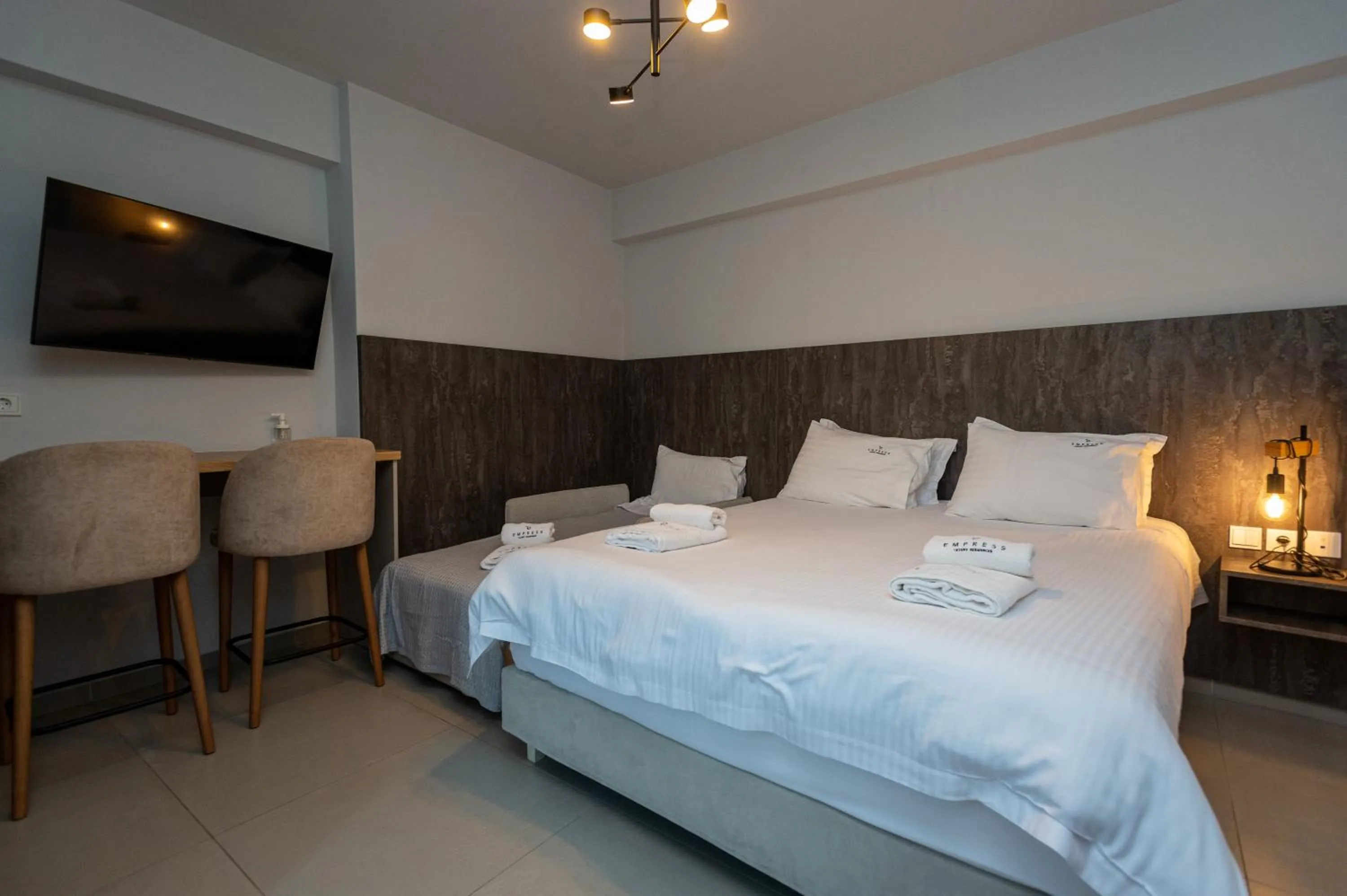 Bed in Empress Luxury Residences