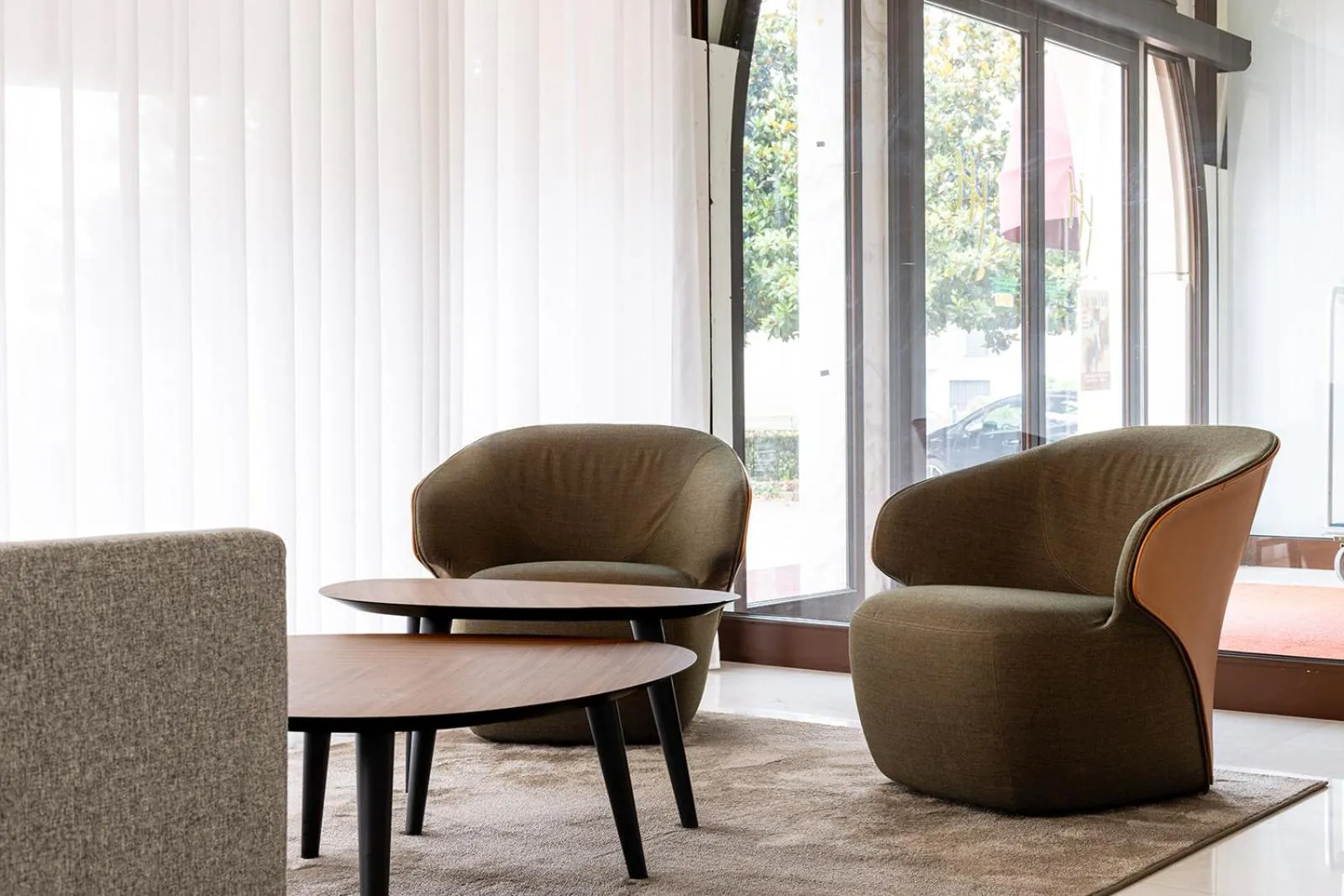 Seating area in B&B HOTEL Habitat Giussano