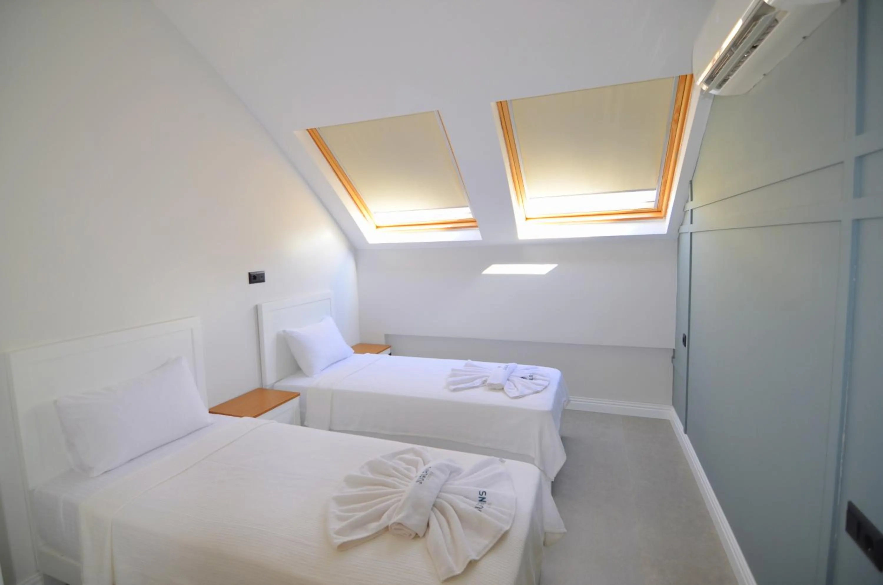 Bed in Juglans Suites