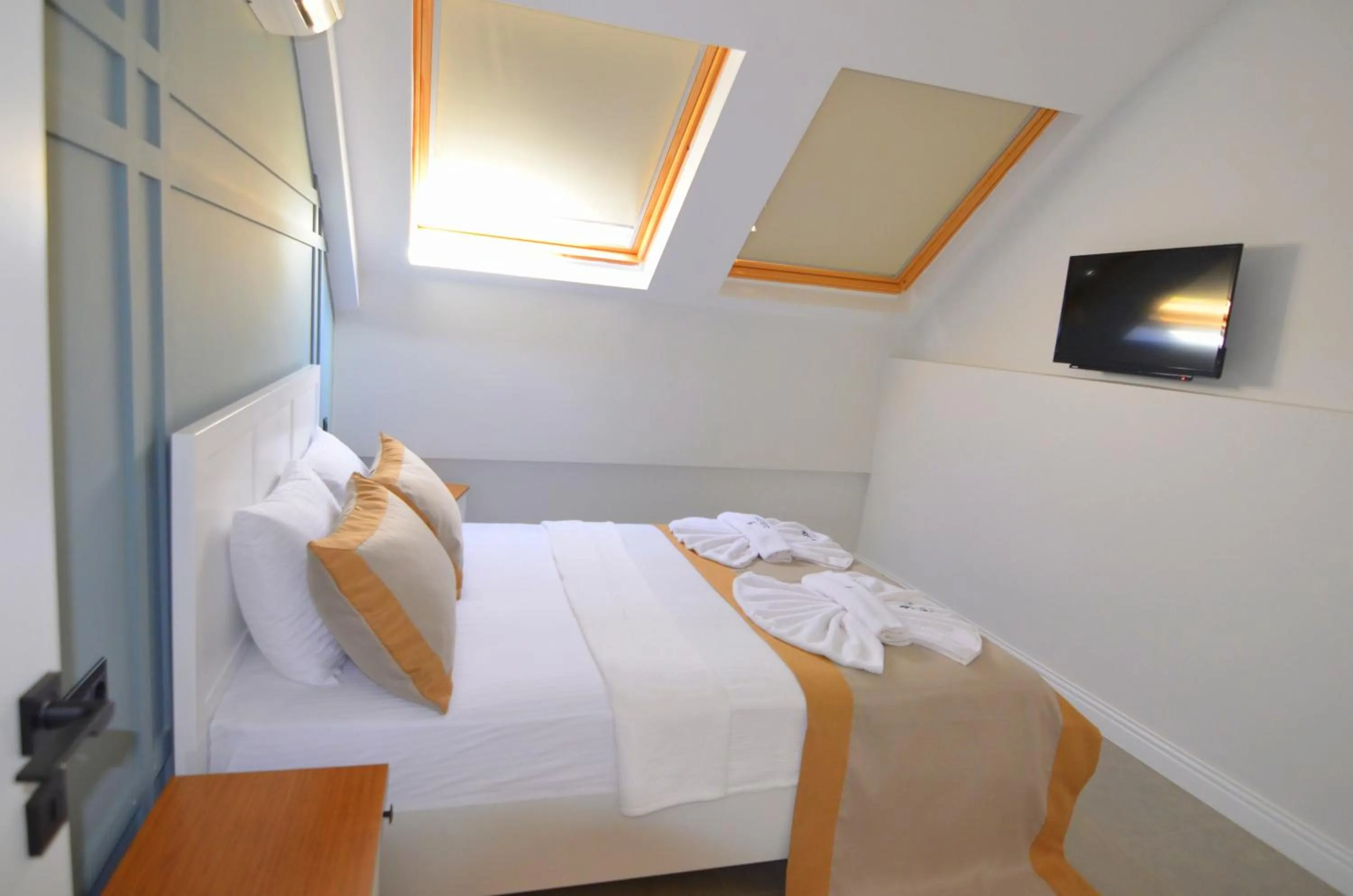 Bed in Juglans Suites