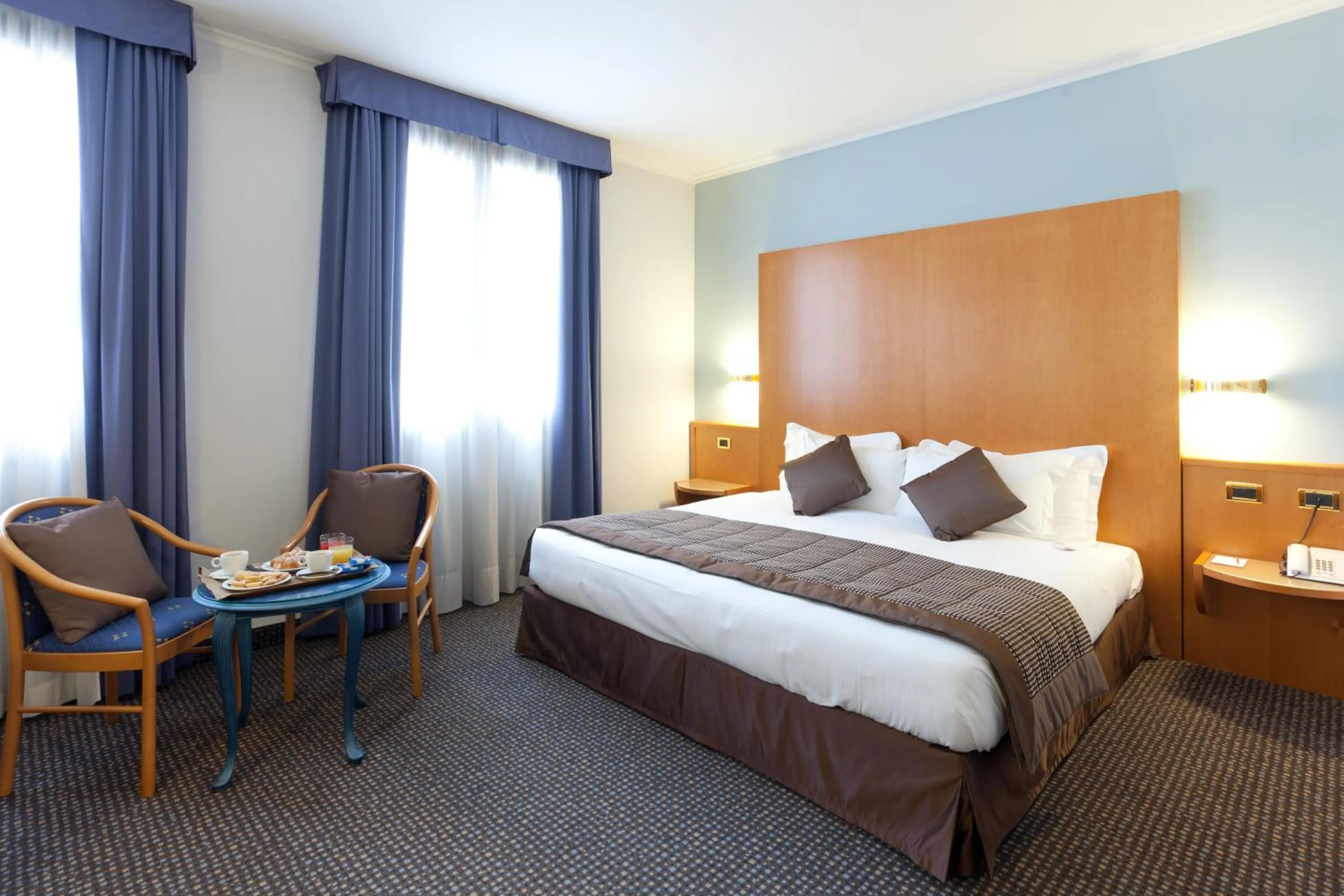 Bed in UNA HOTELS Occhiobello