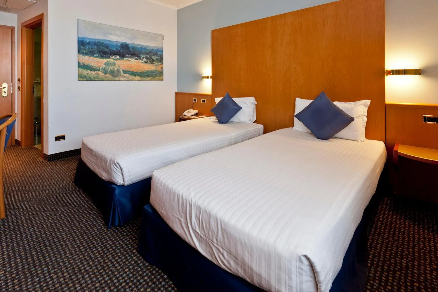 Bed in UNA HOTELS Occhiobello