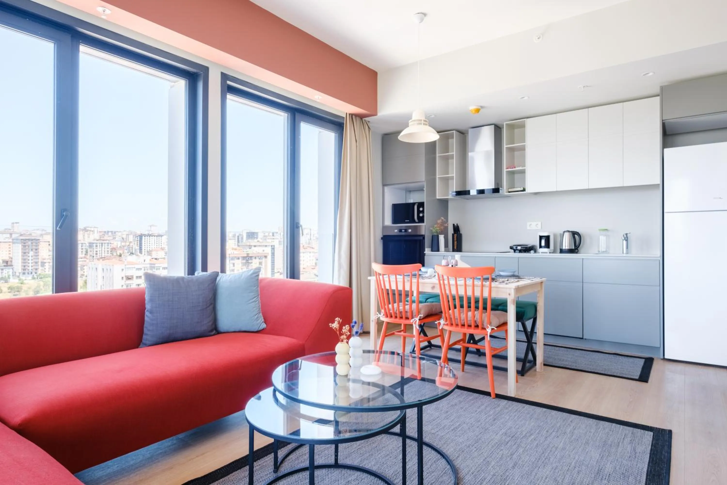 Living room in Roya Nova Residence by NewInn