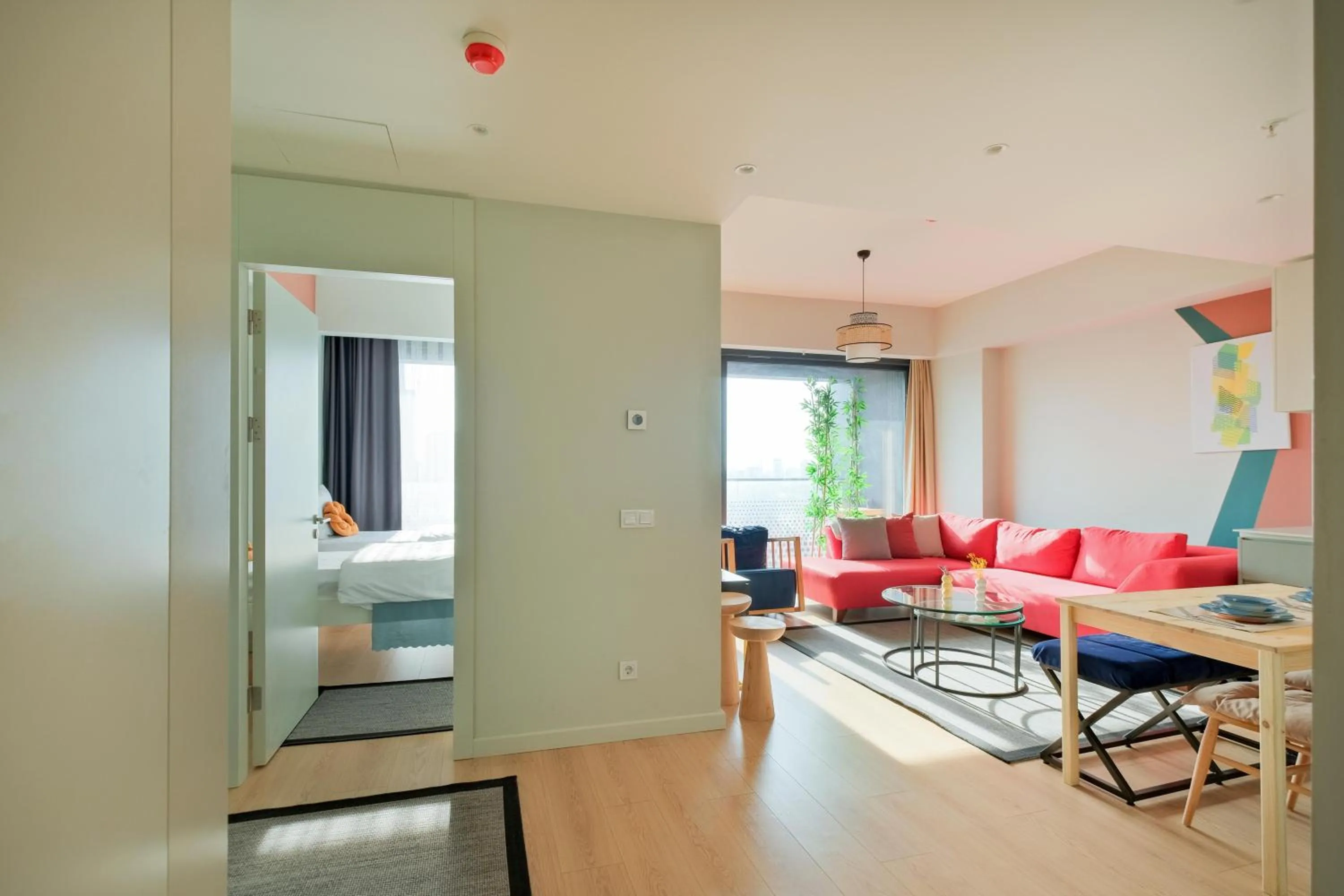 Living room in Roya Nova Residence by NewInn