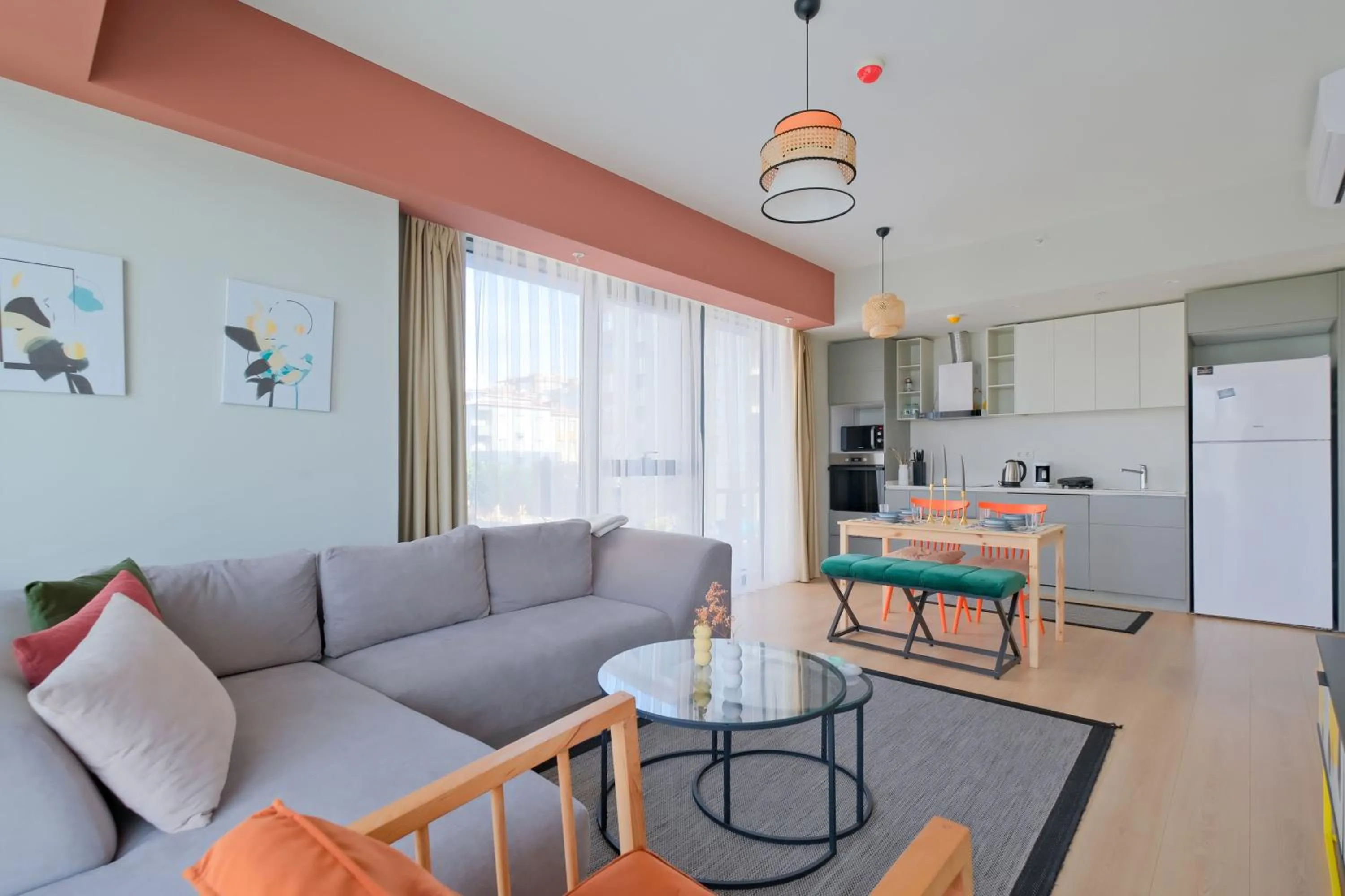 Living room in Roya Nova Residence by NewInn