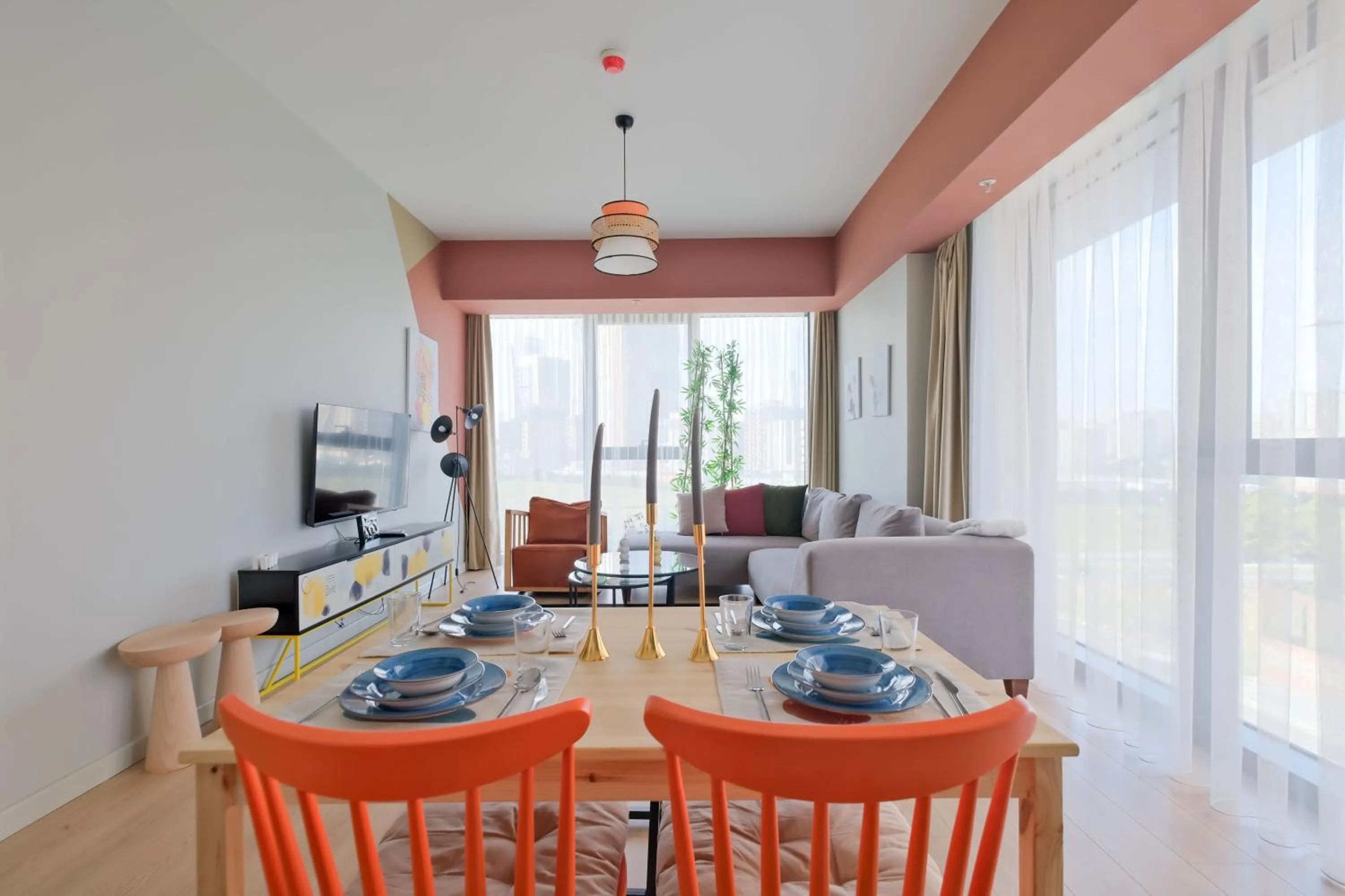 Living room in Roya Nova Residence by NewInn