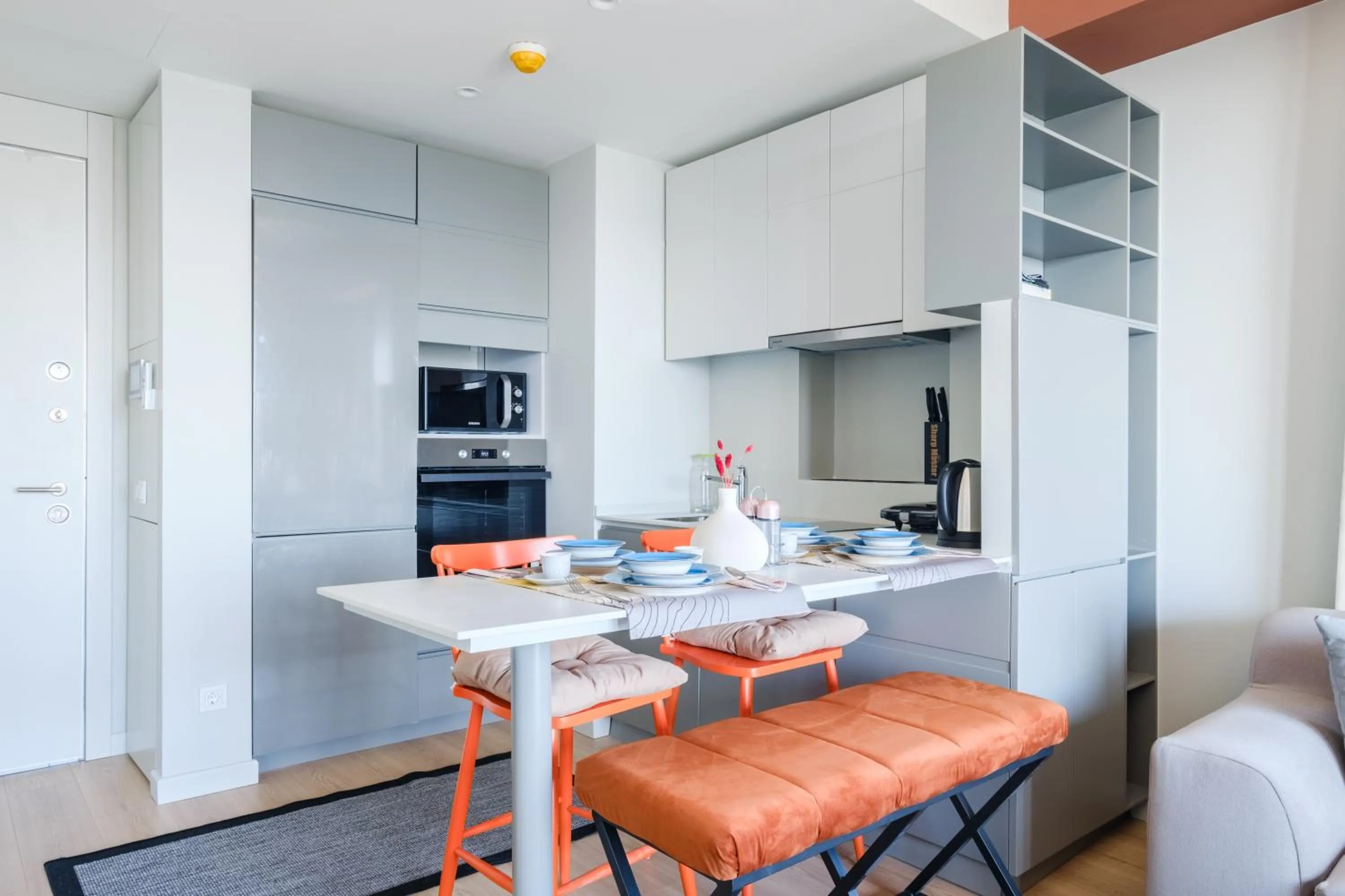 Dining area in Roya Nova Residence by NewInn
