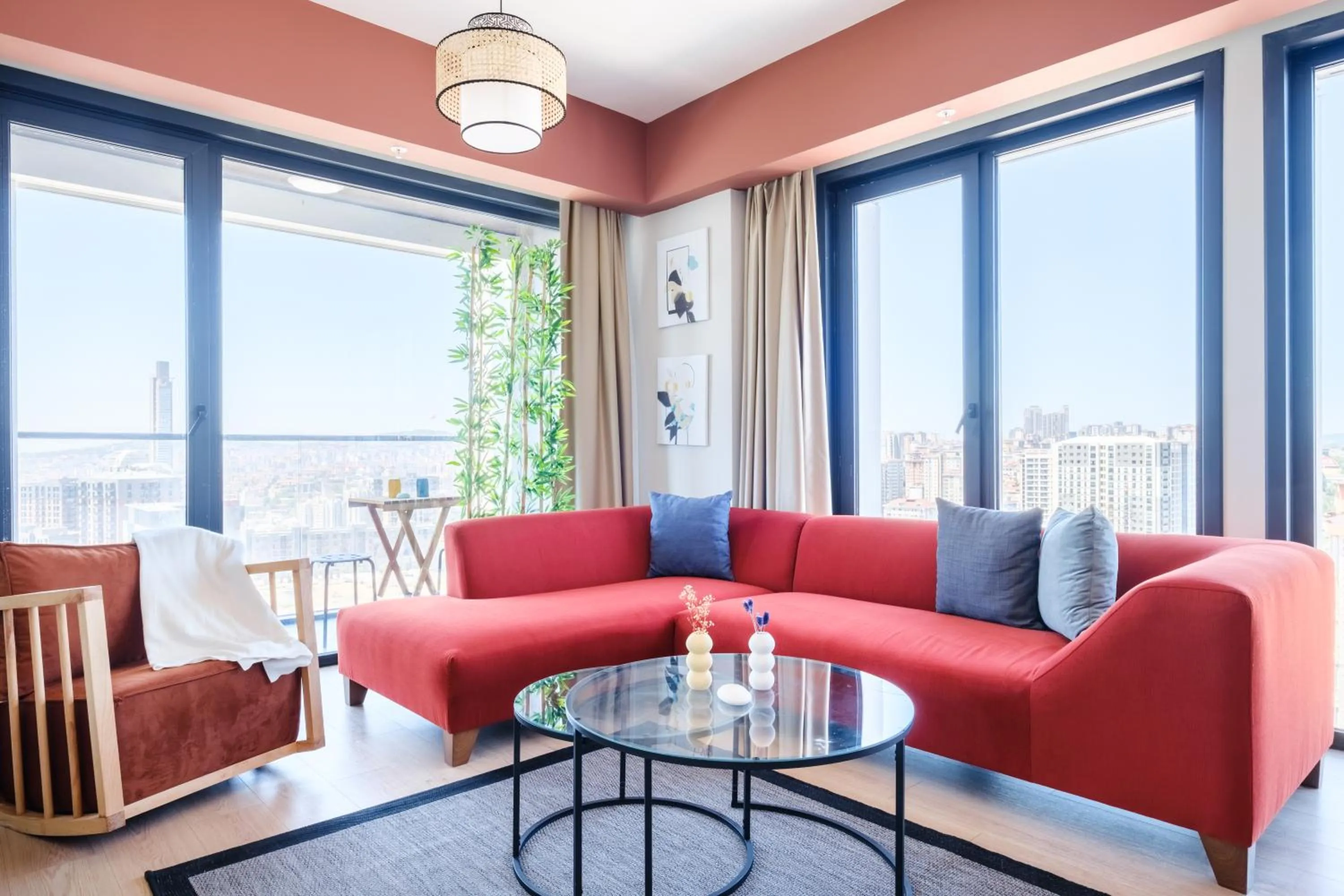 Living room in Roya Nova Residence by NewInn