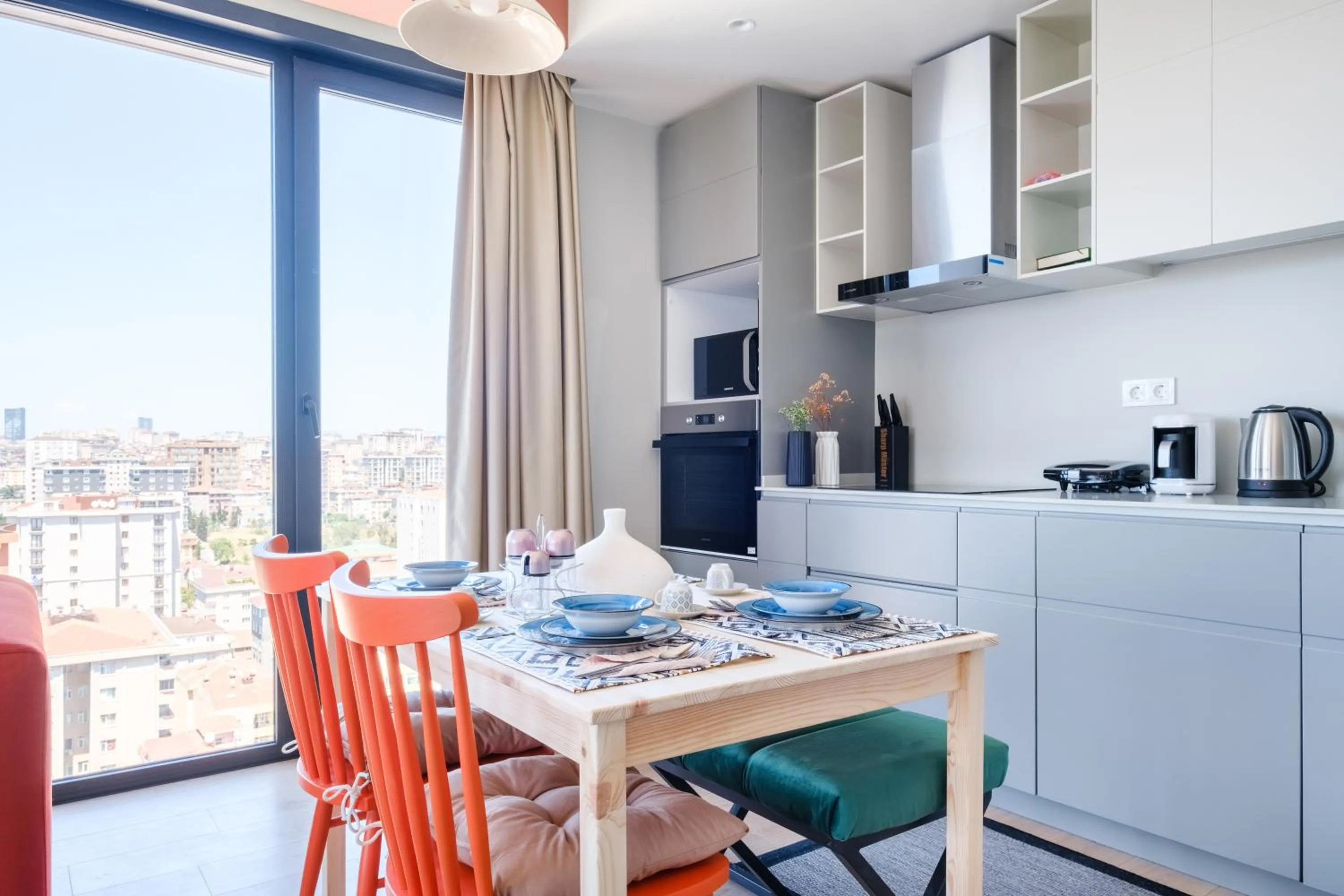 Kitchen or kitchenette in Roya Nova Residence by NewInn