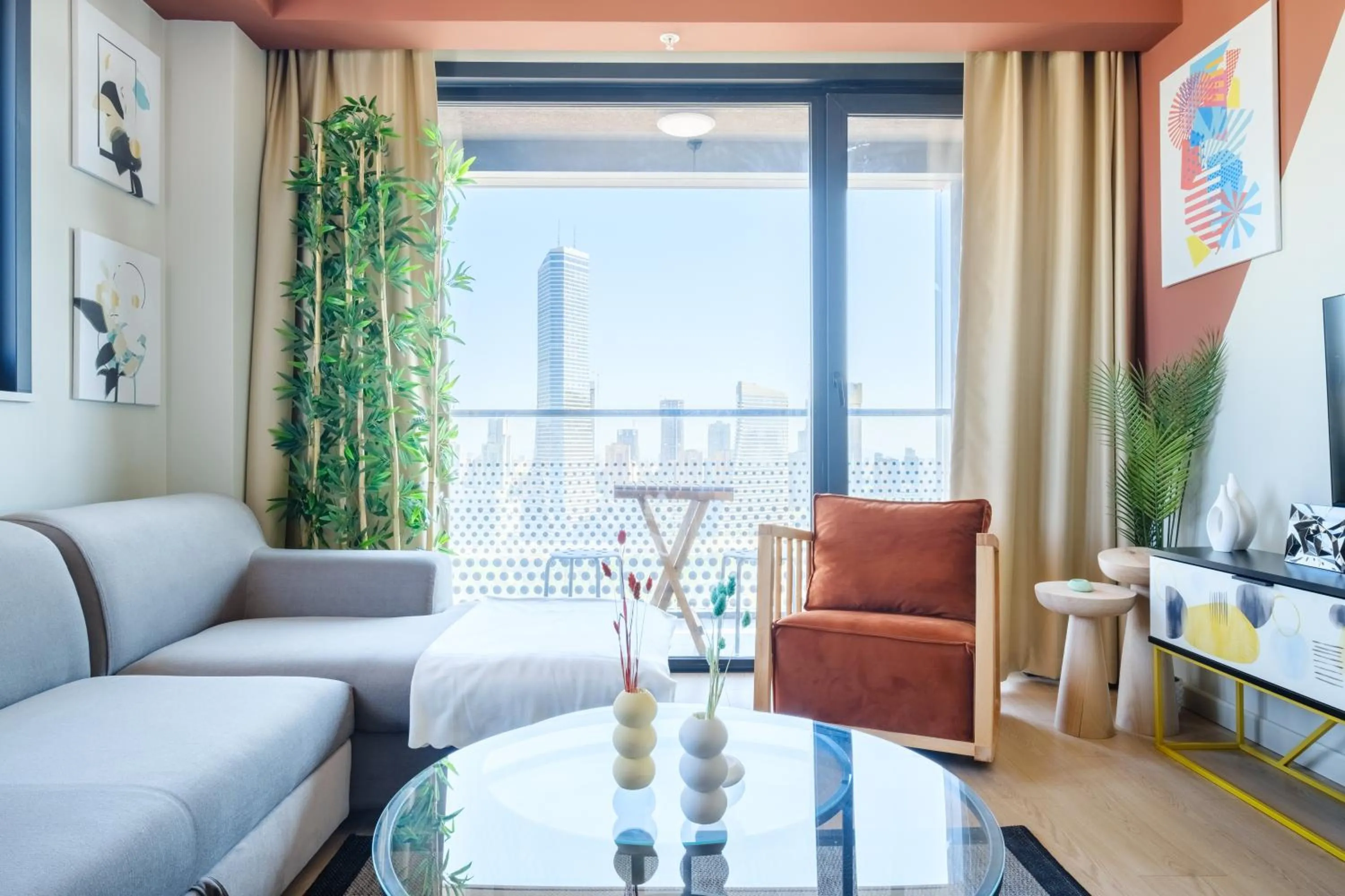 Living room in Roya Nova Residence by NewInn