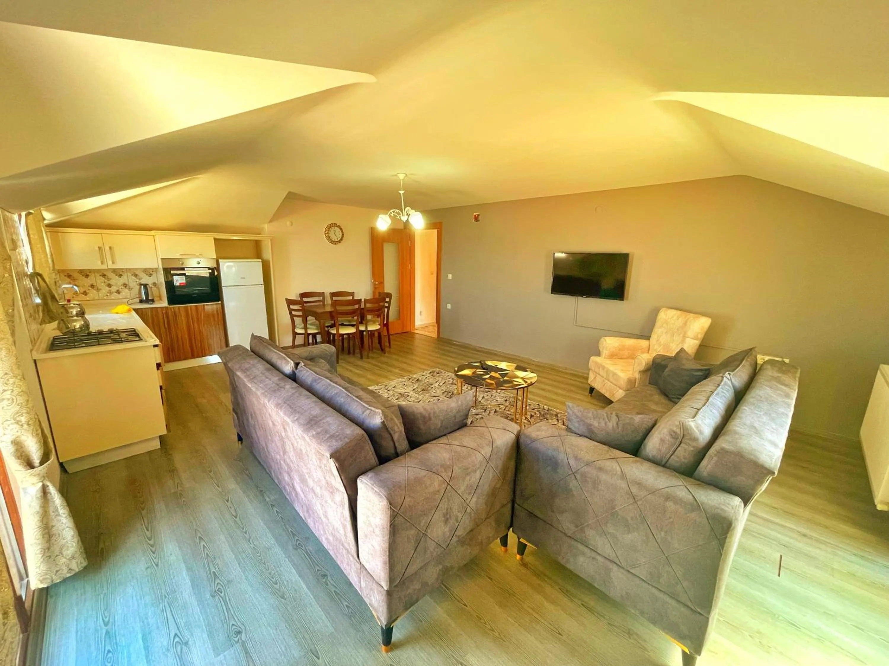 Kitchen or kitchenette in LUSTRA GARDEN SUİTE