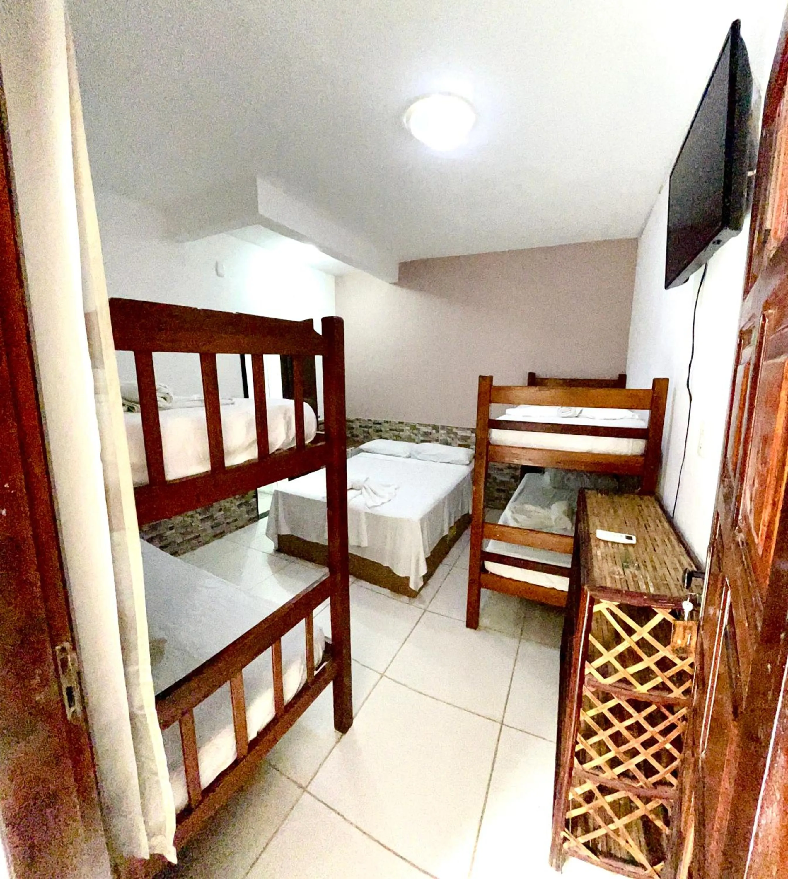 Photo of the whole room, Bed in Pousada Timbalada